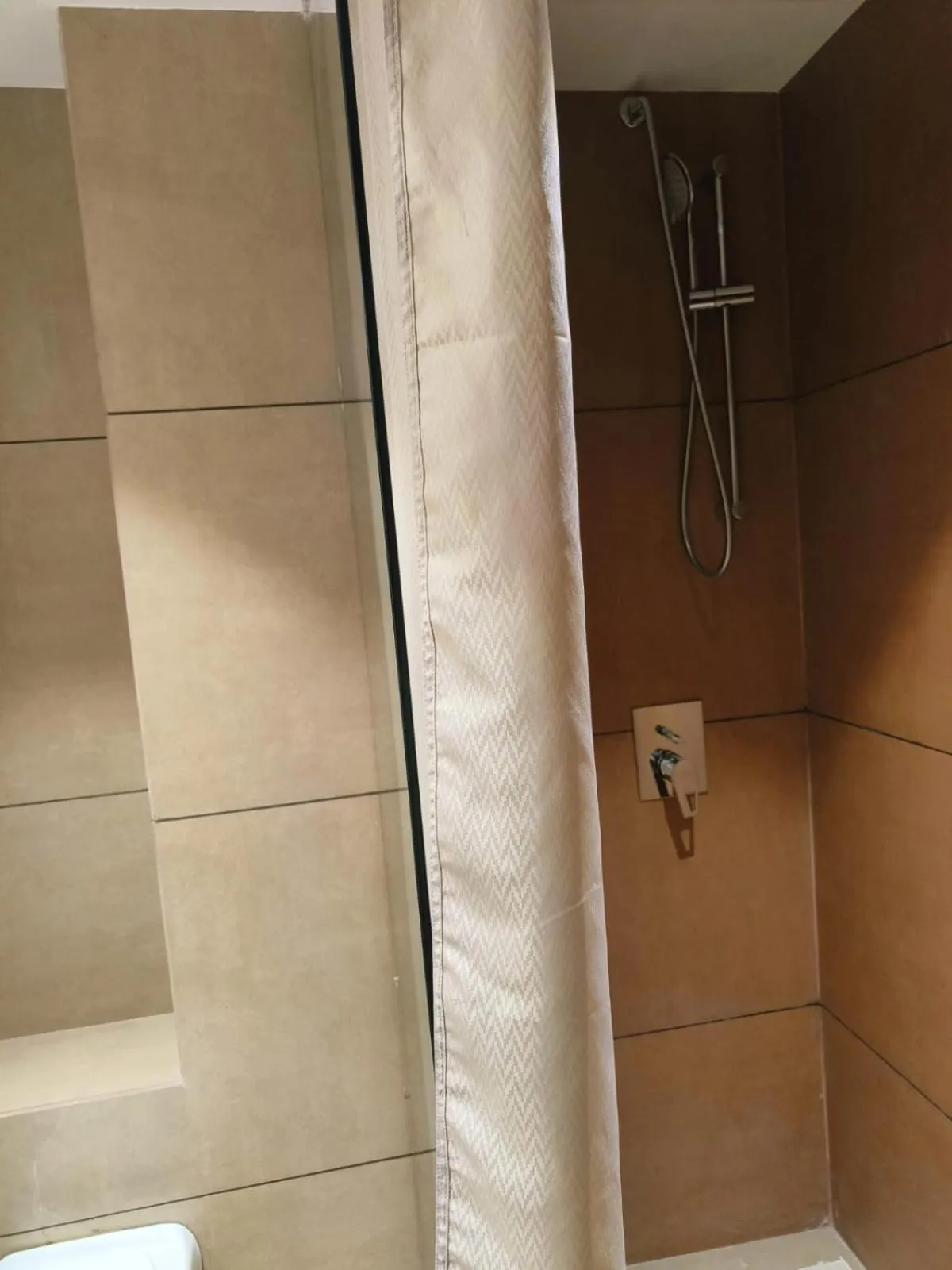 Shower in Ramee International Surat