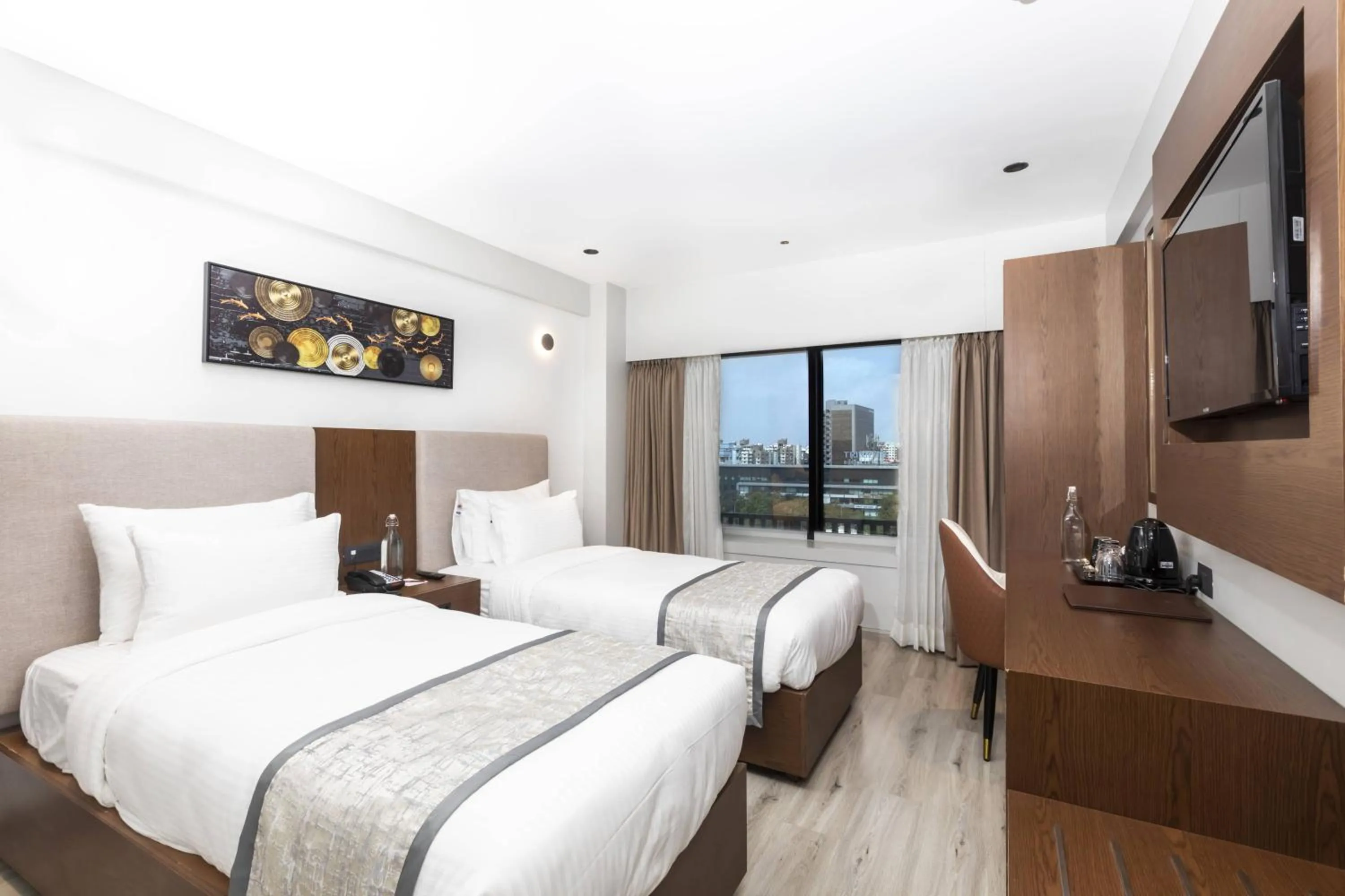 Bed in Ramee International Surat