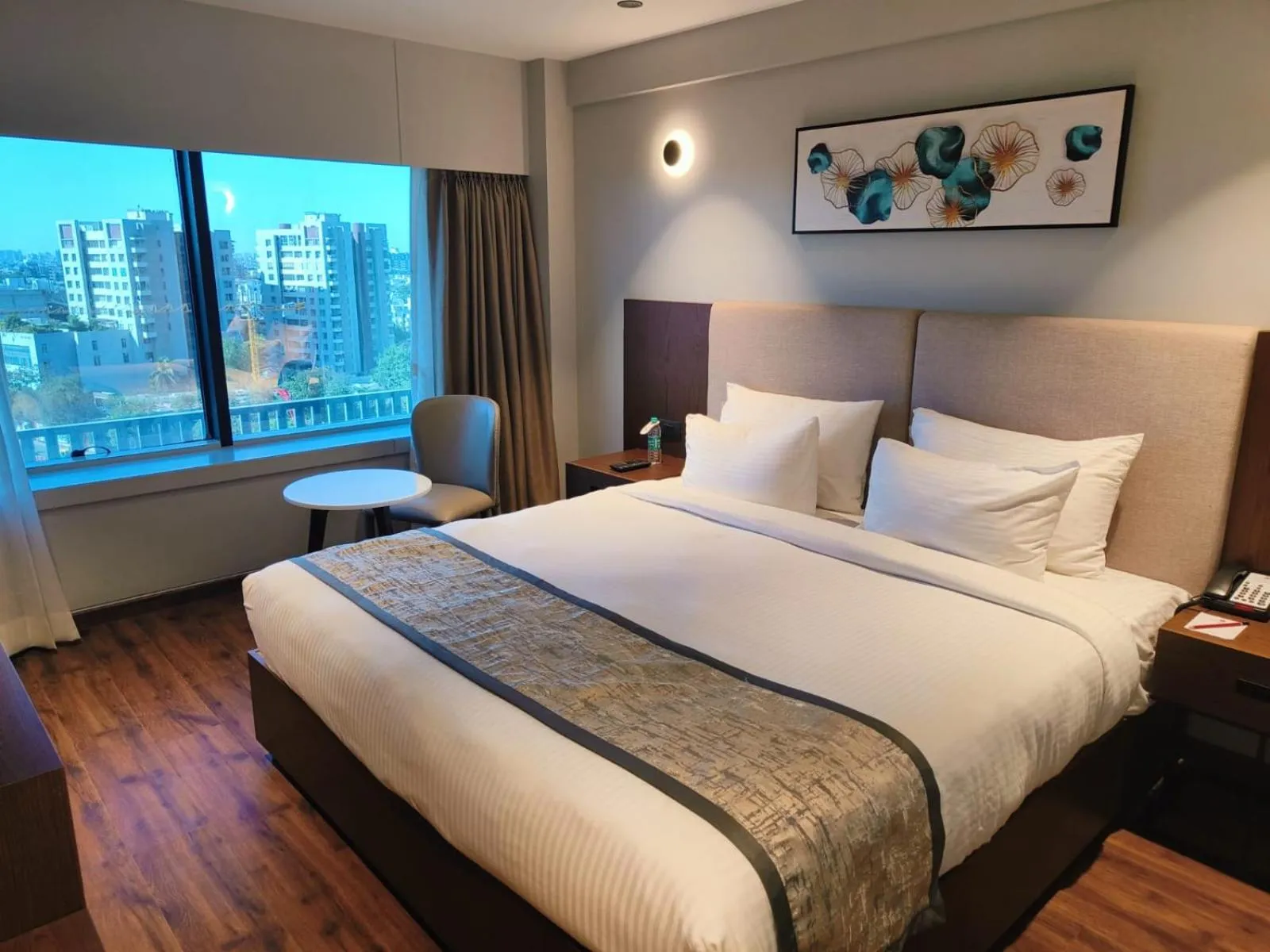 Photo of the whole room, Bed in Ramee International Surat