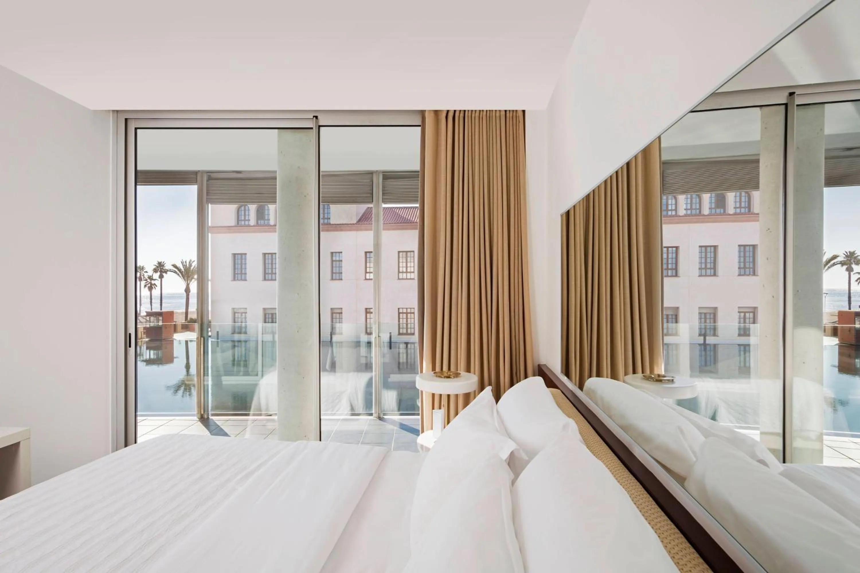 Photo of the whole room, Bed in Le Meridien Ra Beach Hotel and Spa