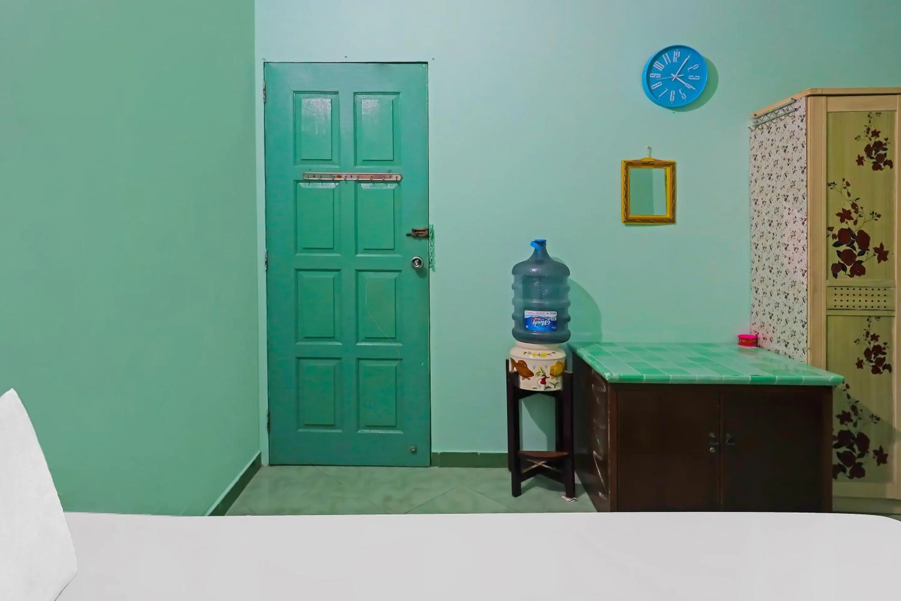 Bedroom in Hotel O Homestay Bude Sri