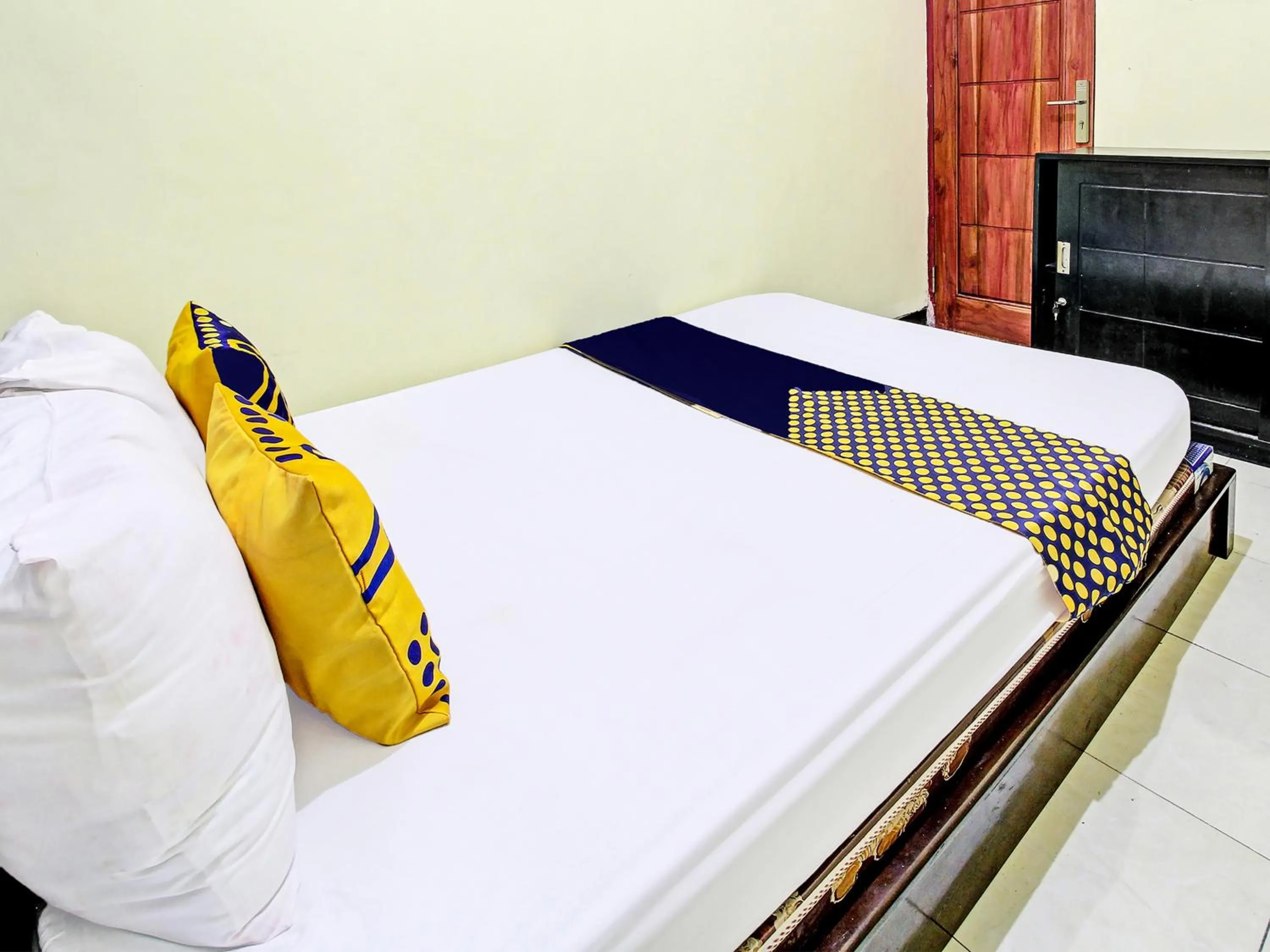 Bedroom in Hotel O Chikam House Syariah