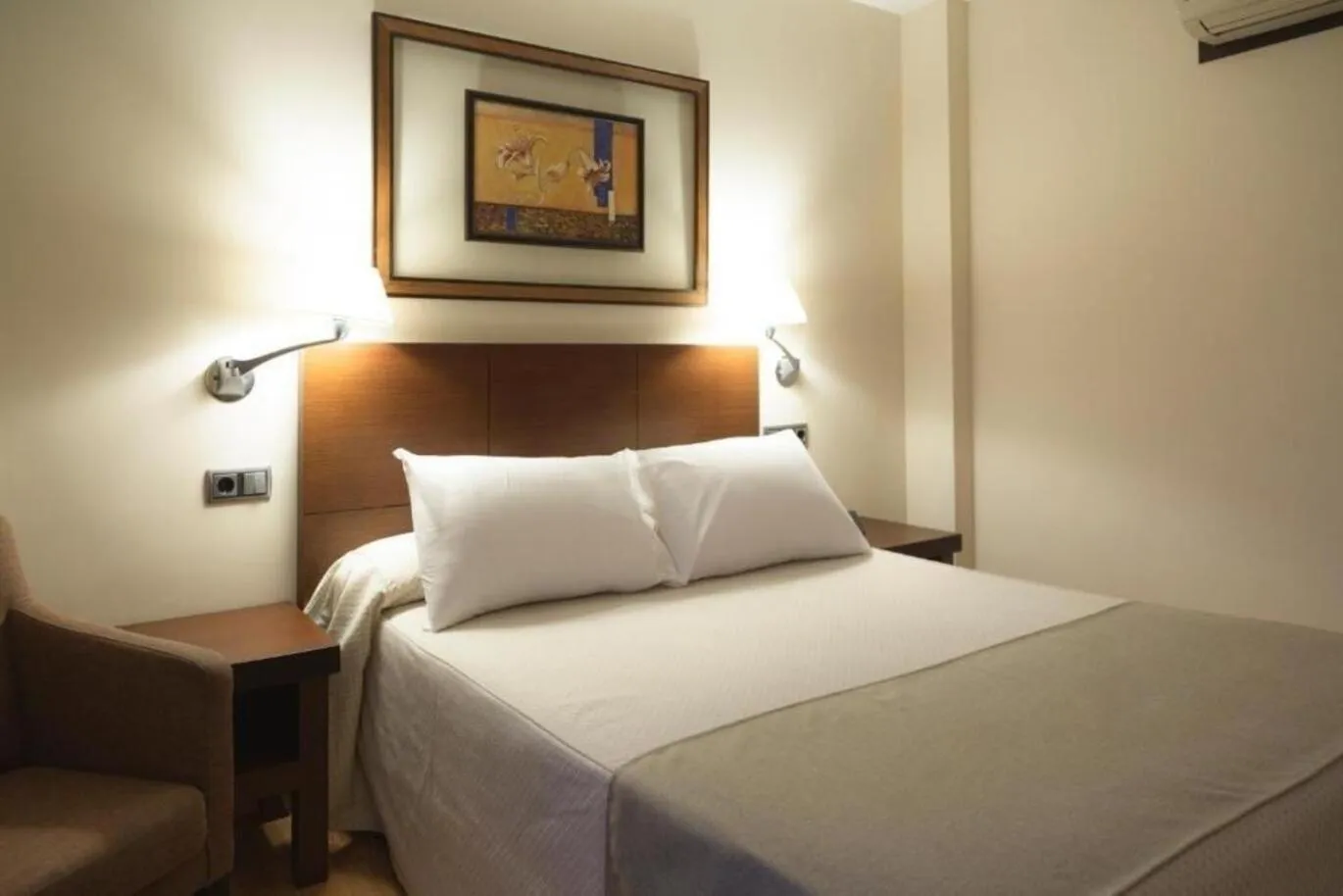 Bed in Hotel Cristina