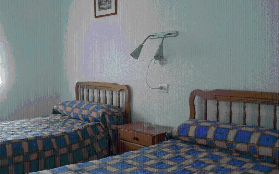 Photo of the whole room, Bed in La Obrera