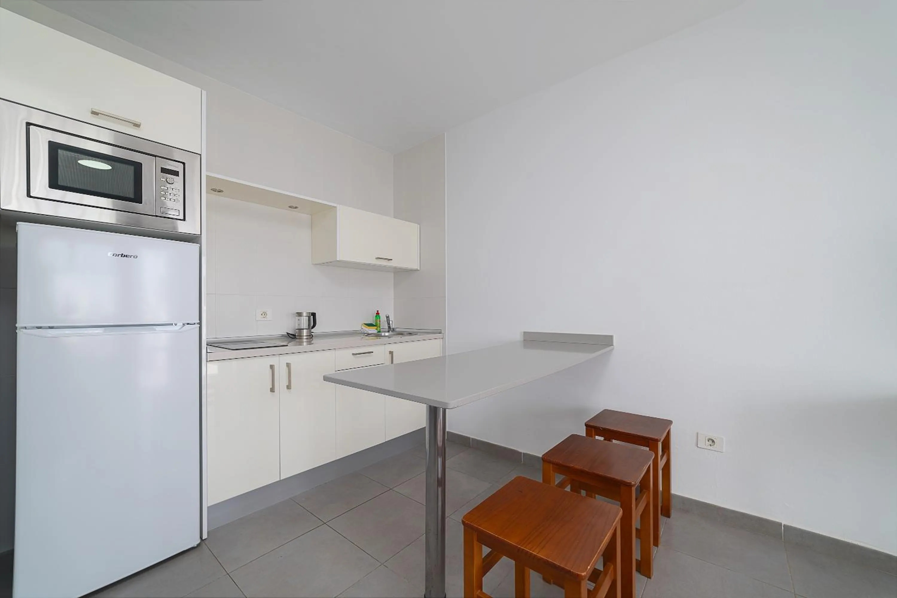 Kitchen or kitchenette in Apartamentos Elena
