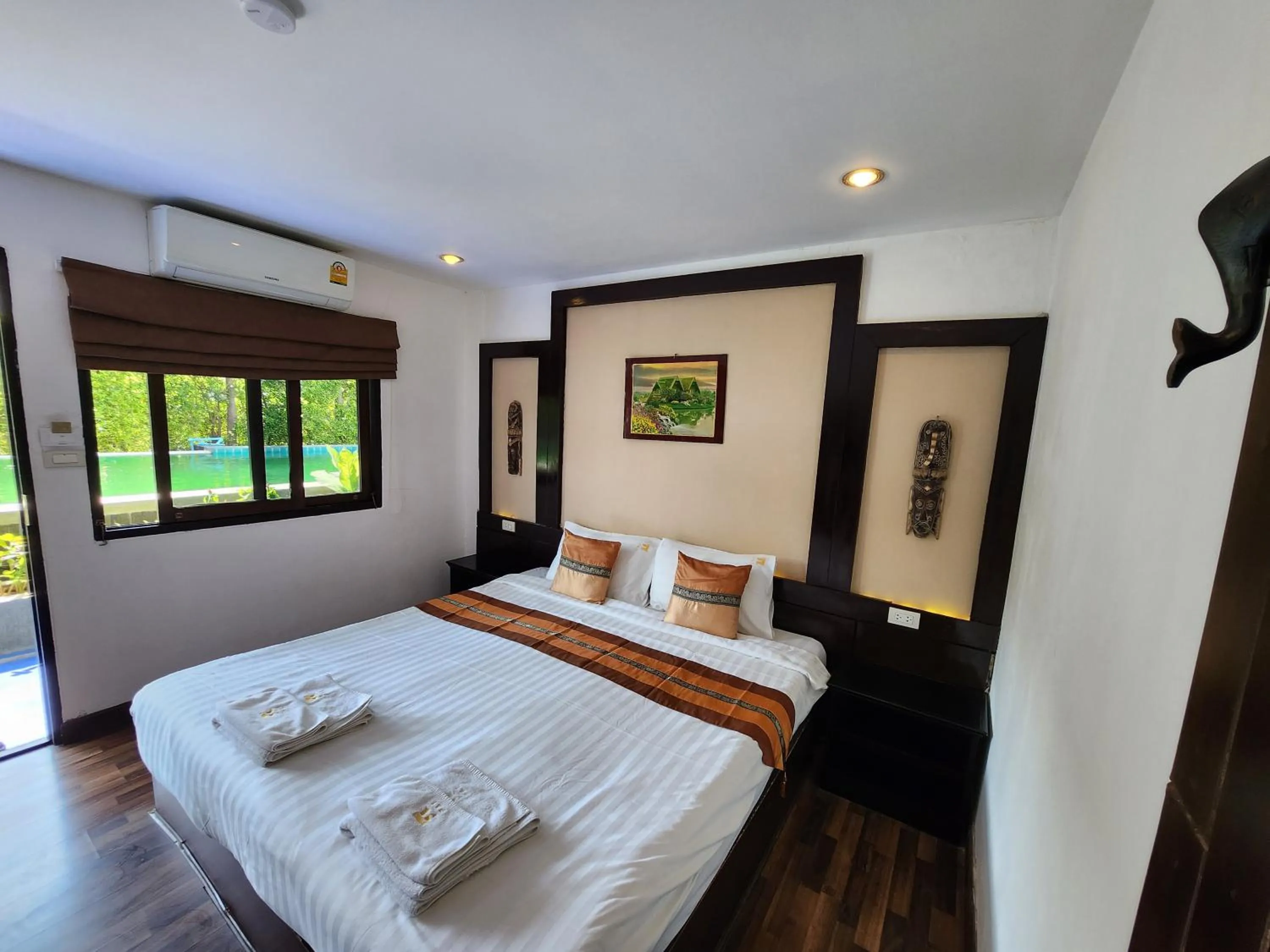 Bed in Pai Residence Hotel