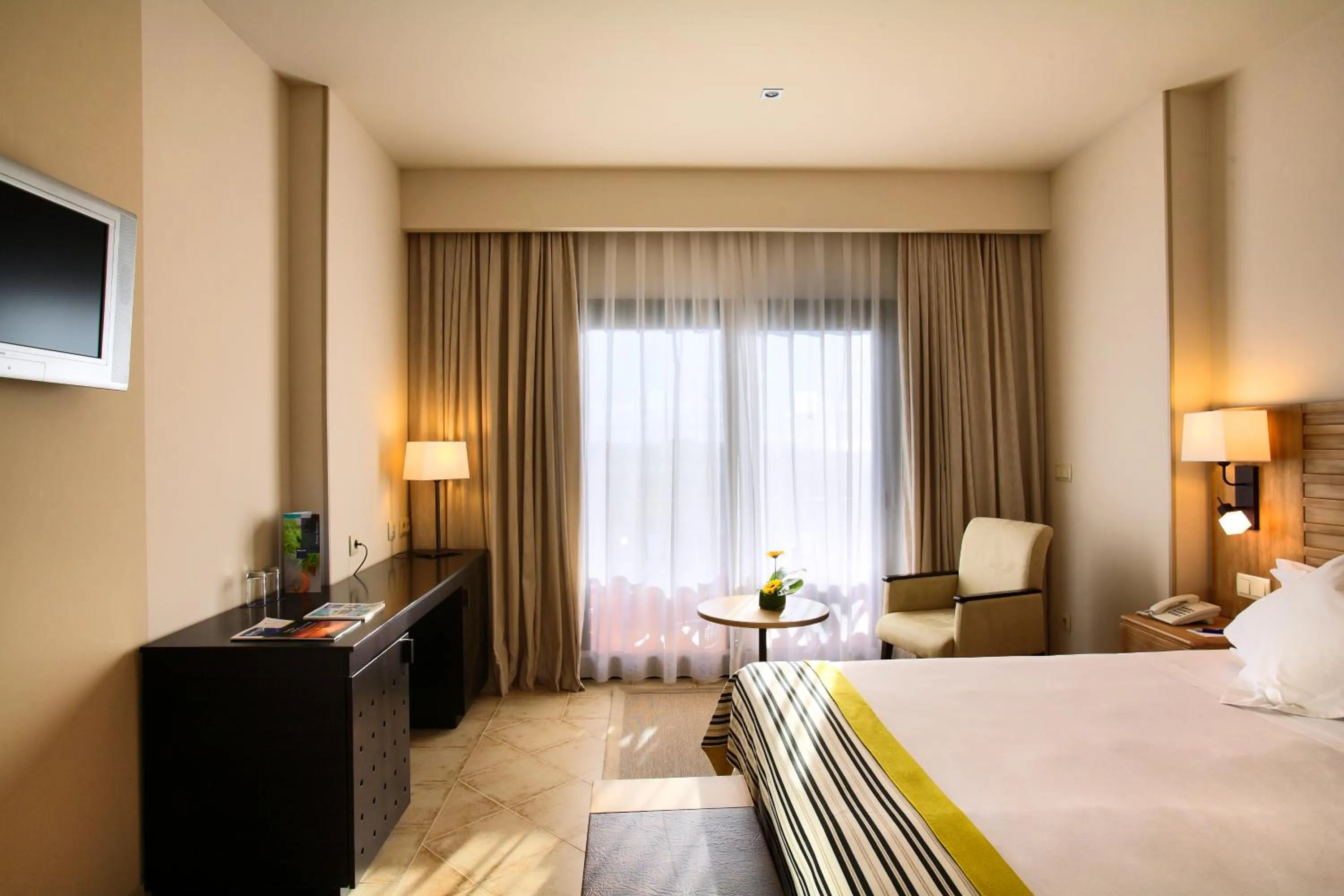 Photo of the whole room, Bed in Barceló Punta Umbría Beach Resort