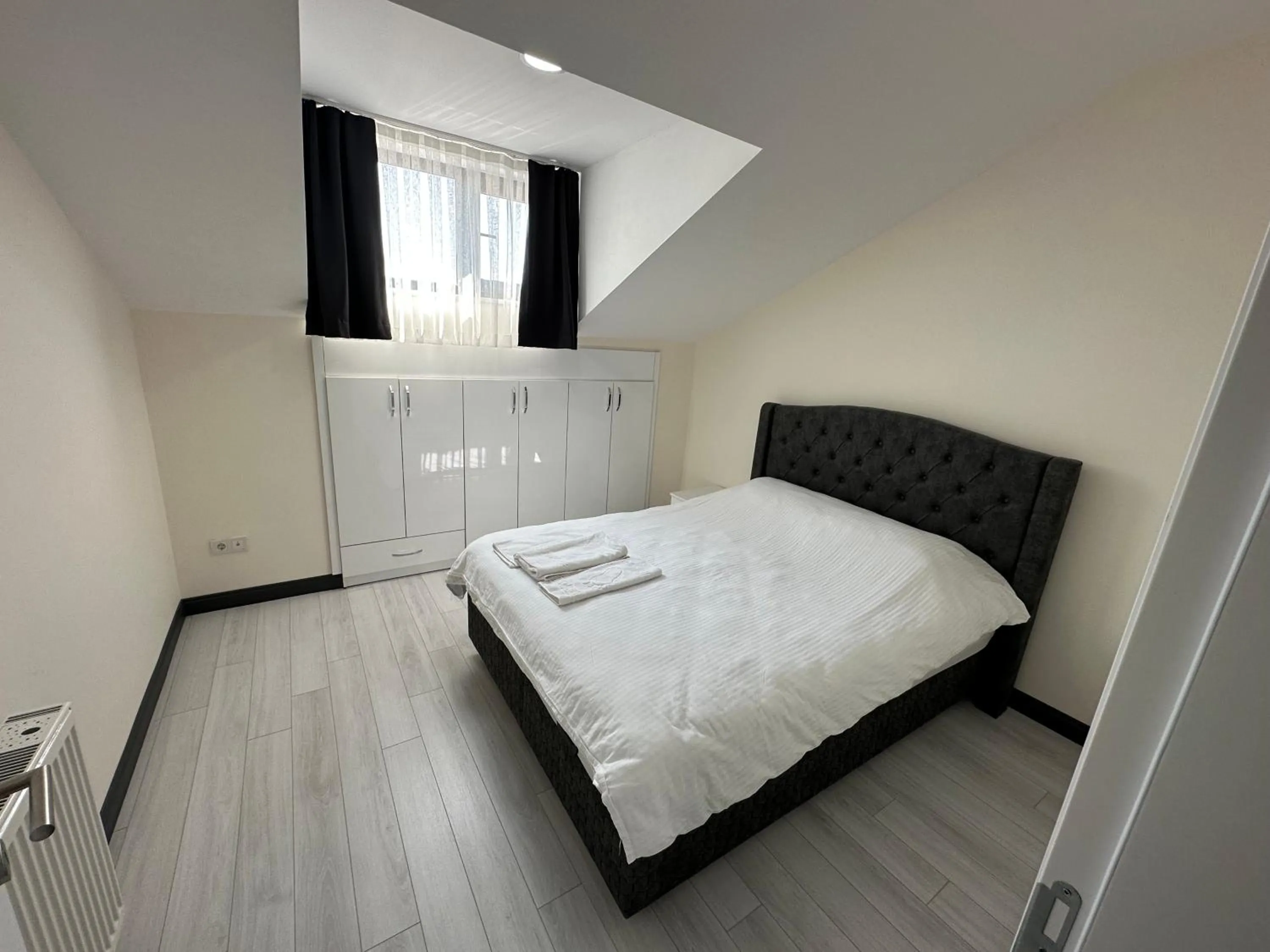 Bed in Rose Plus Residence