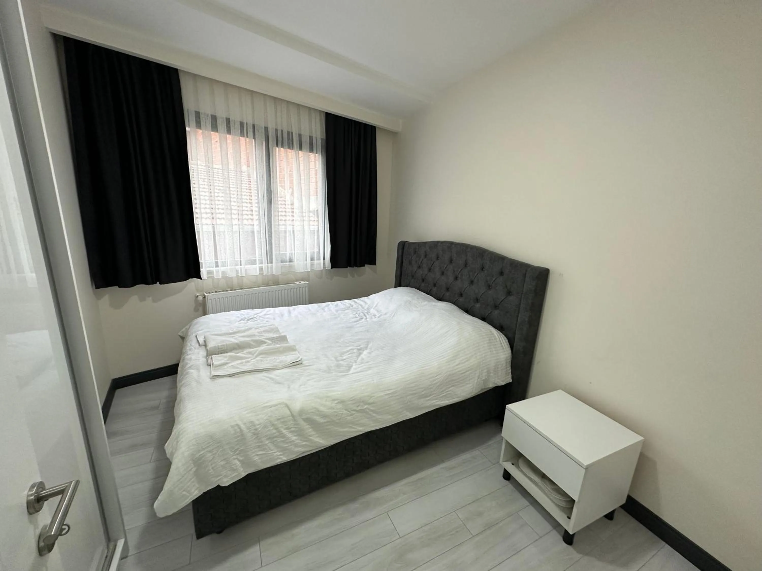 Bed in Rose Plus Residence