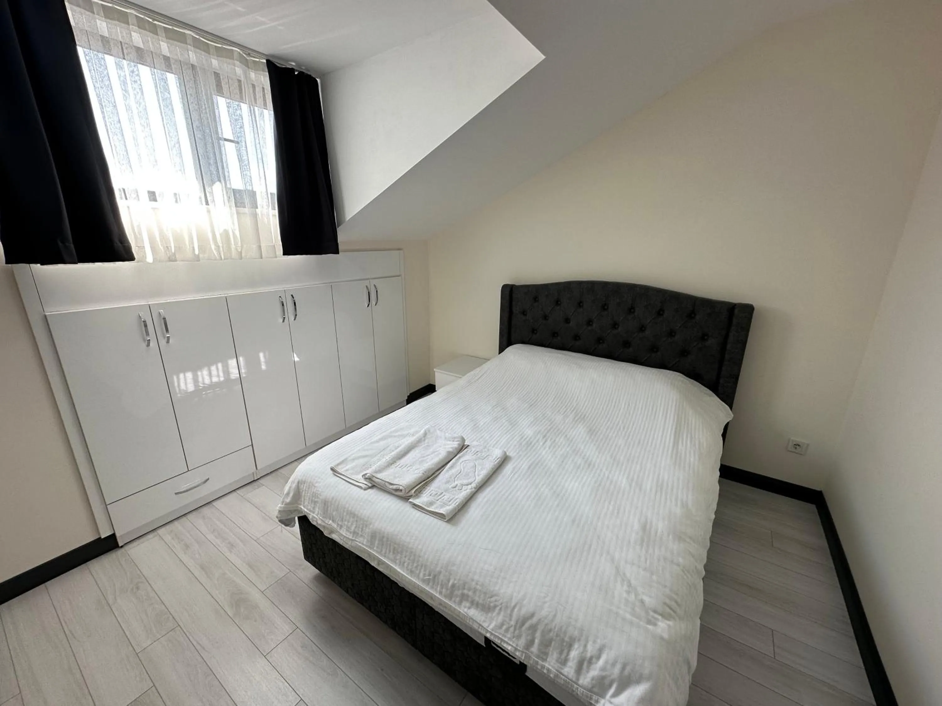 Bed in Rose Plus Residence