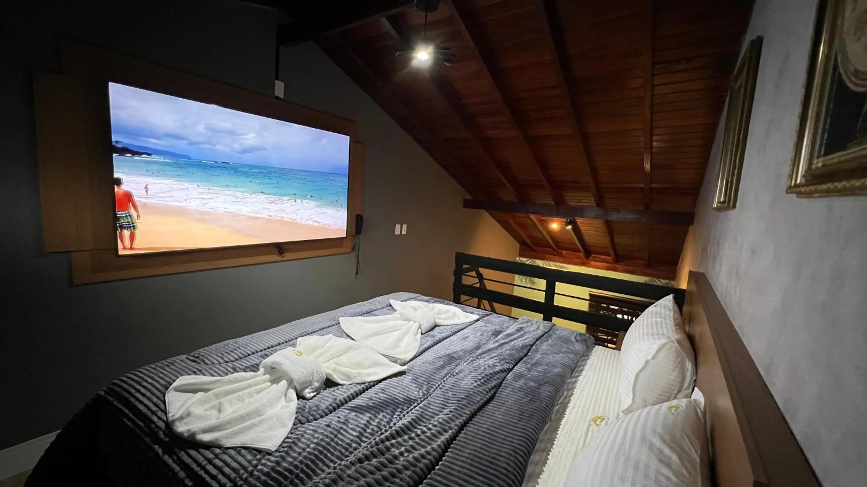 Communal lounge/ TV room, Bed in Hotel La Serena