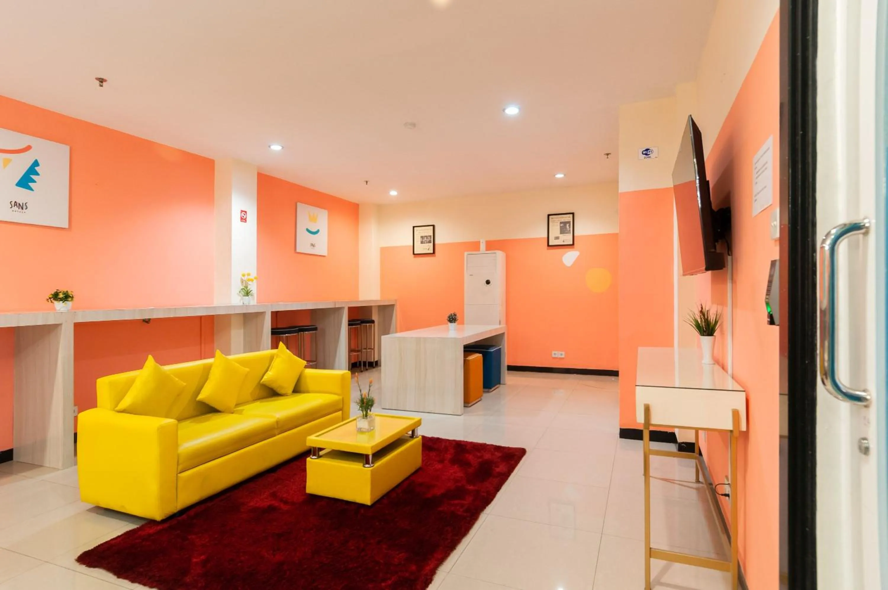Living room in Sans Hotel Finest Medan