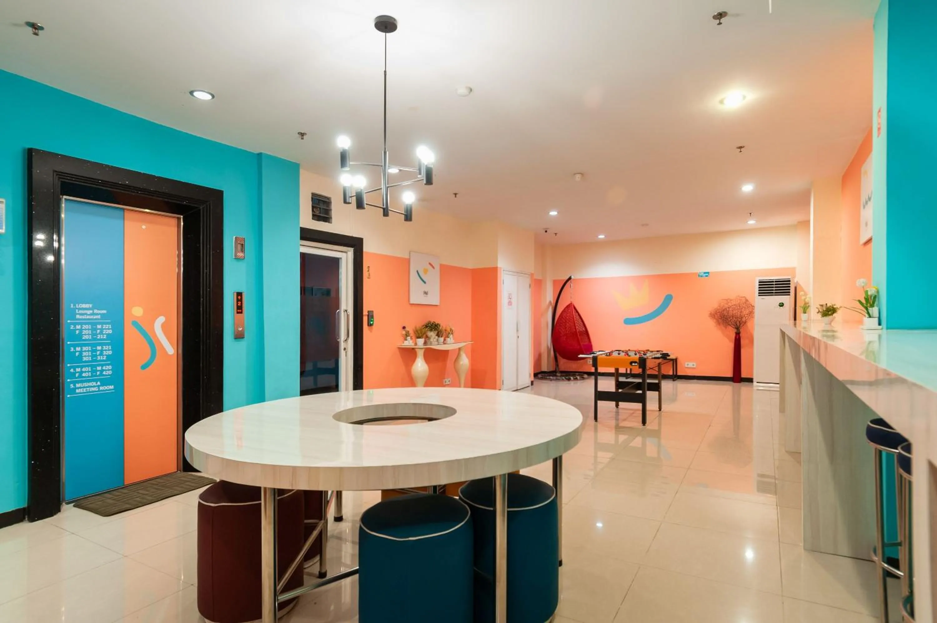 Seating area in Sans Hotel Finest Medan