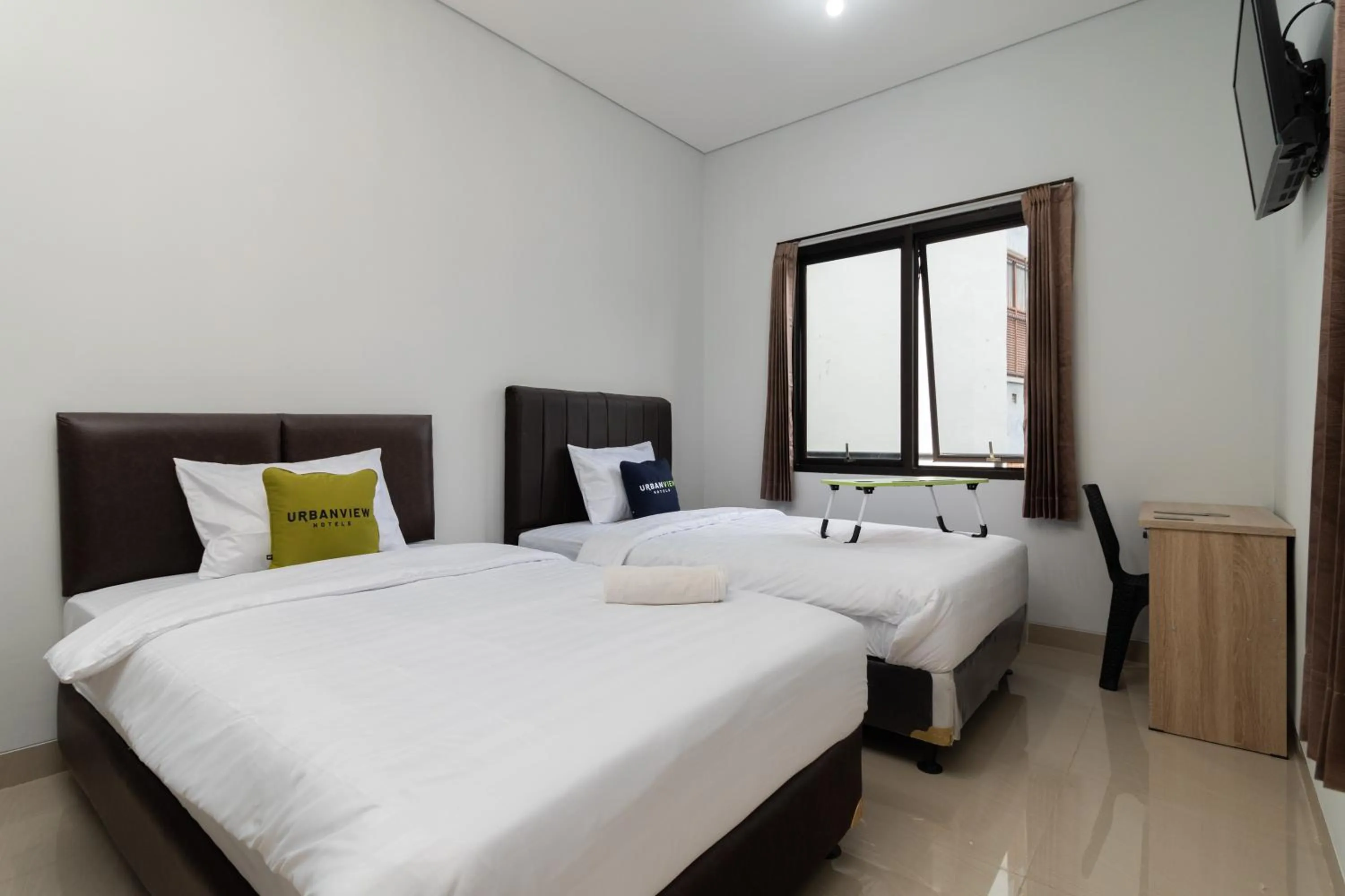 Bedroom, Bed in Urbanview Hotel Pasar Baru Jakarta by RedDoorz