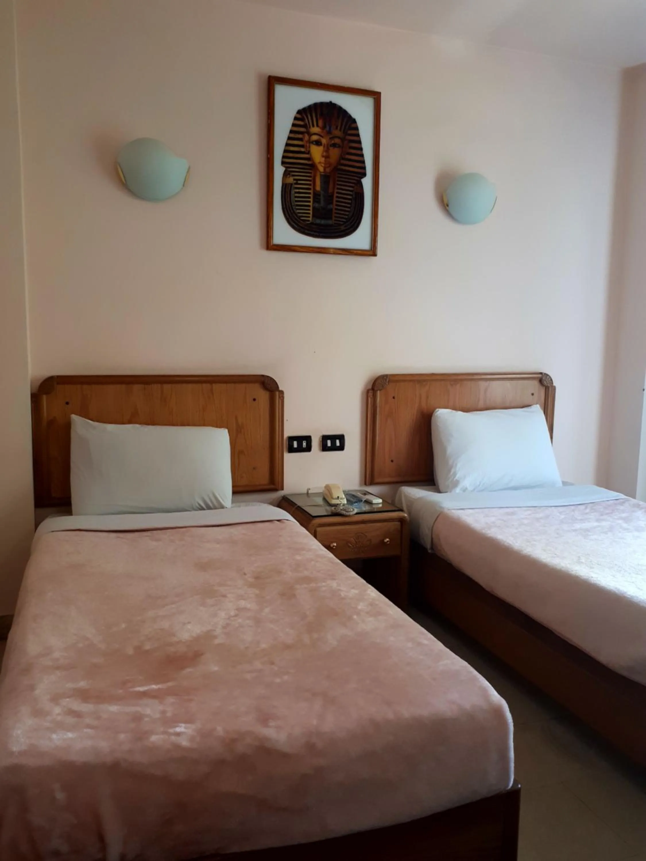 Bed in New Pola Hotel