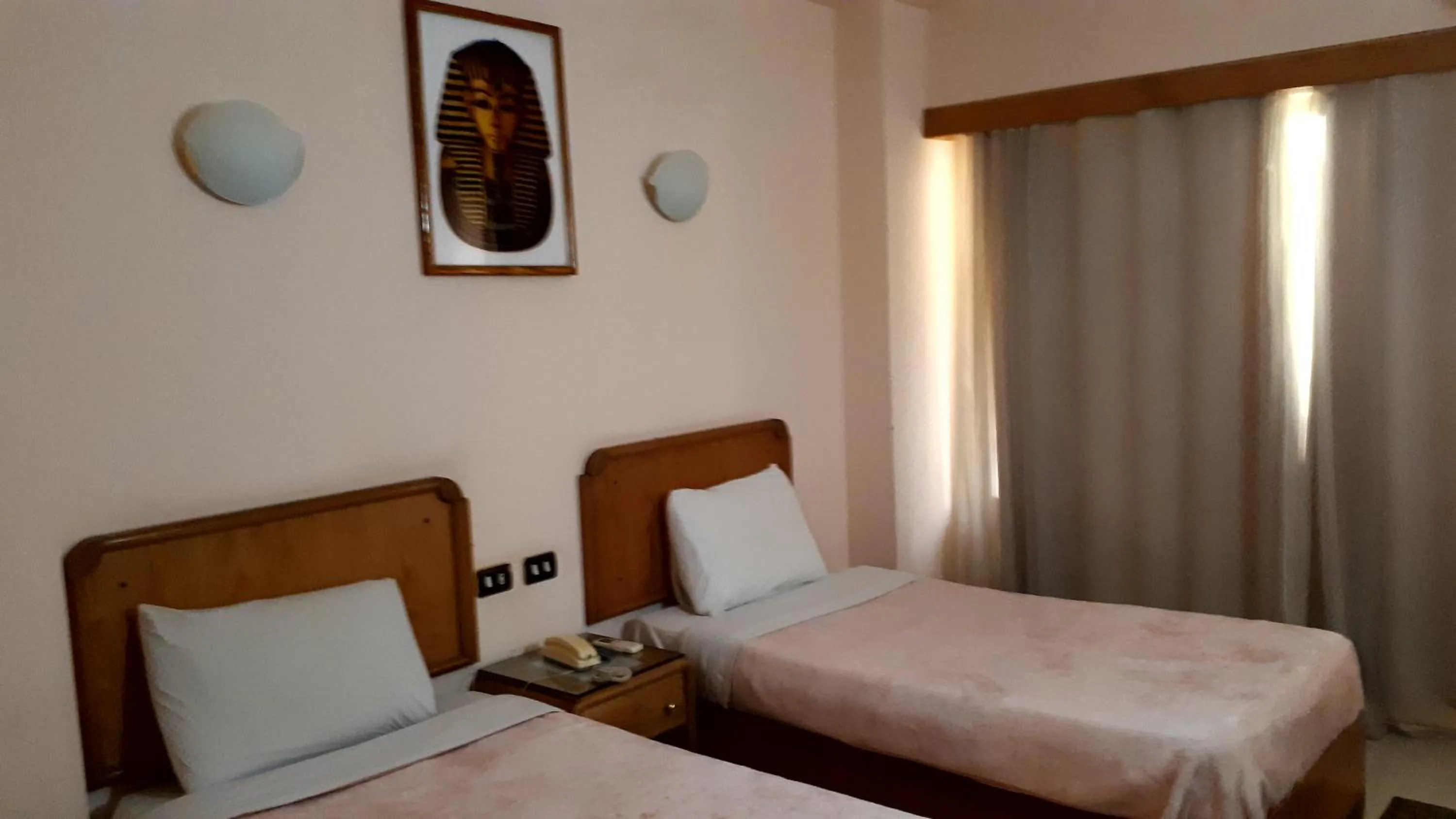 Bed in New Pola Hotel