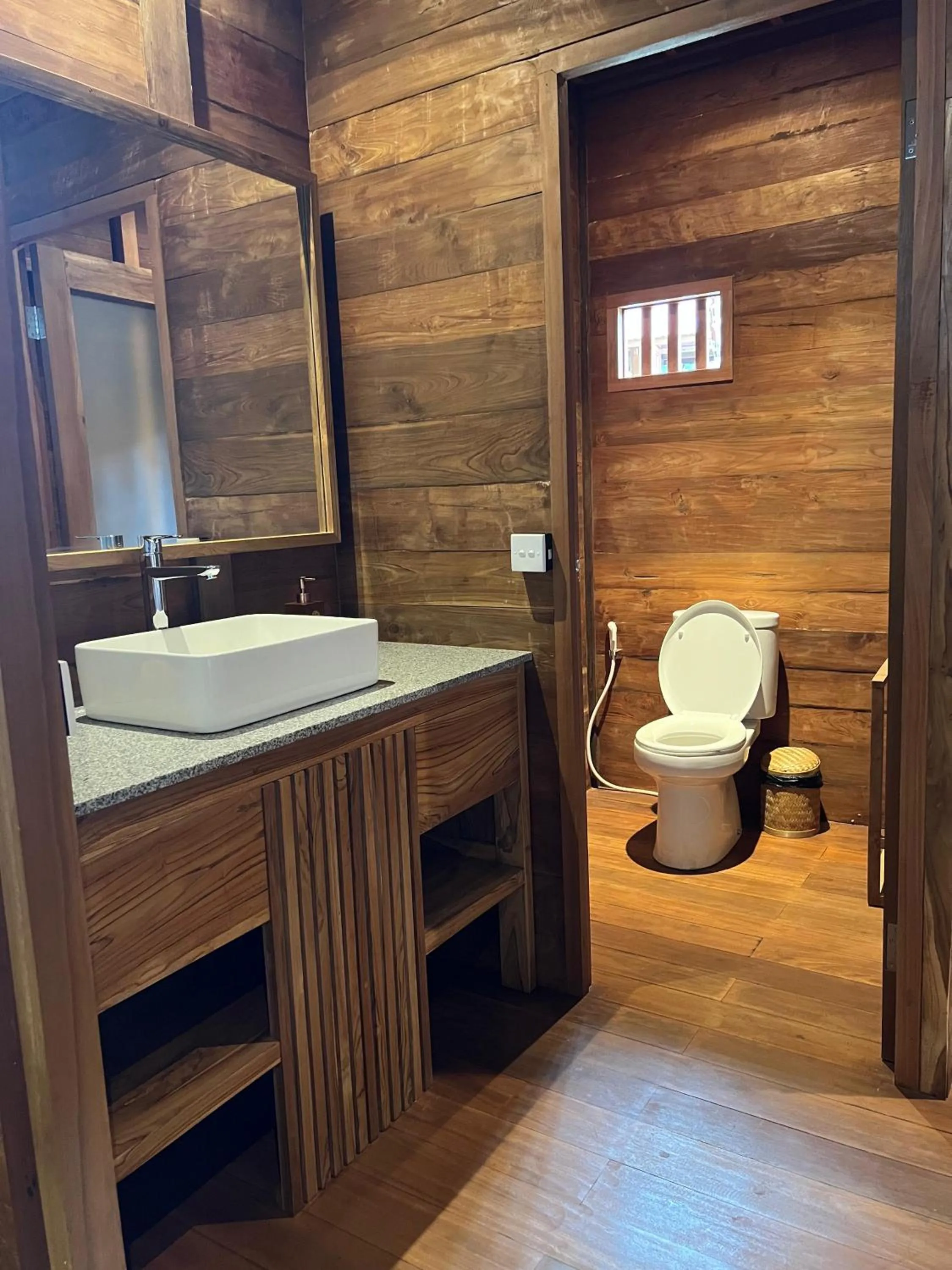 Toilet in RUMAH KAYU RESORT