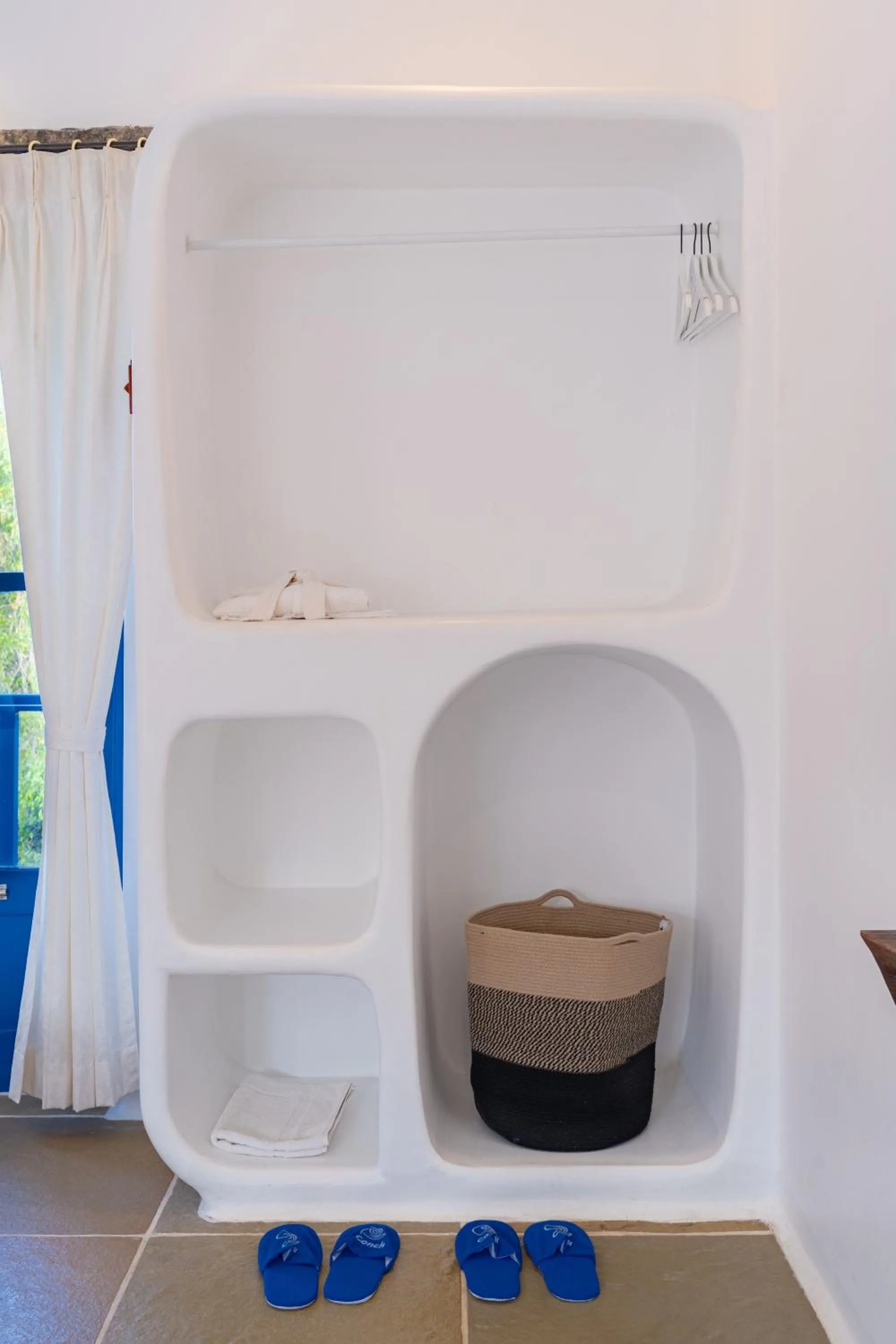 wardrobe in Conch Resort Luxury Private Pool Suites