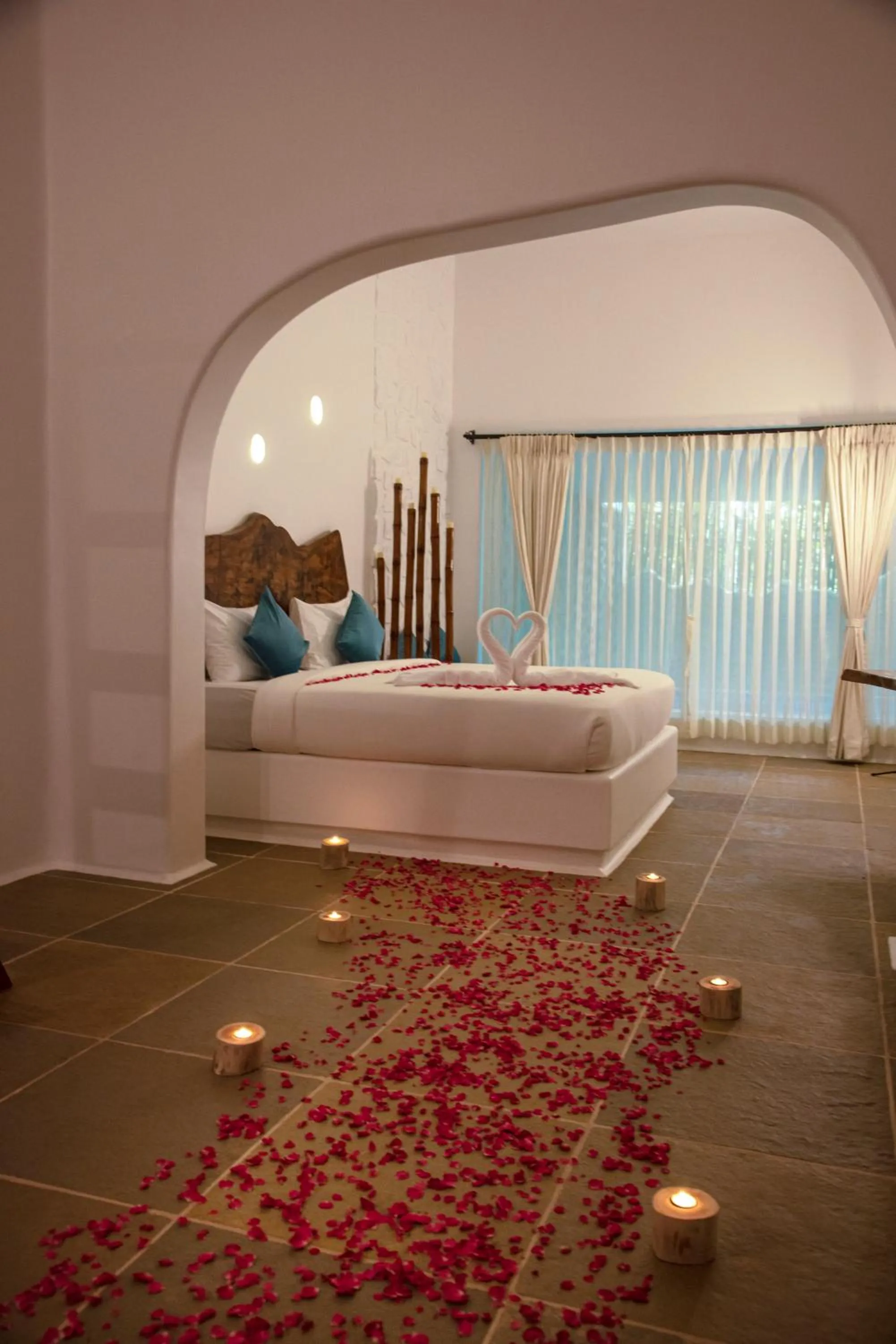 Bed in Conch Resort Luxury Private Pool Suites