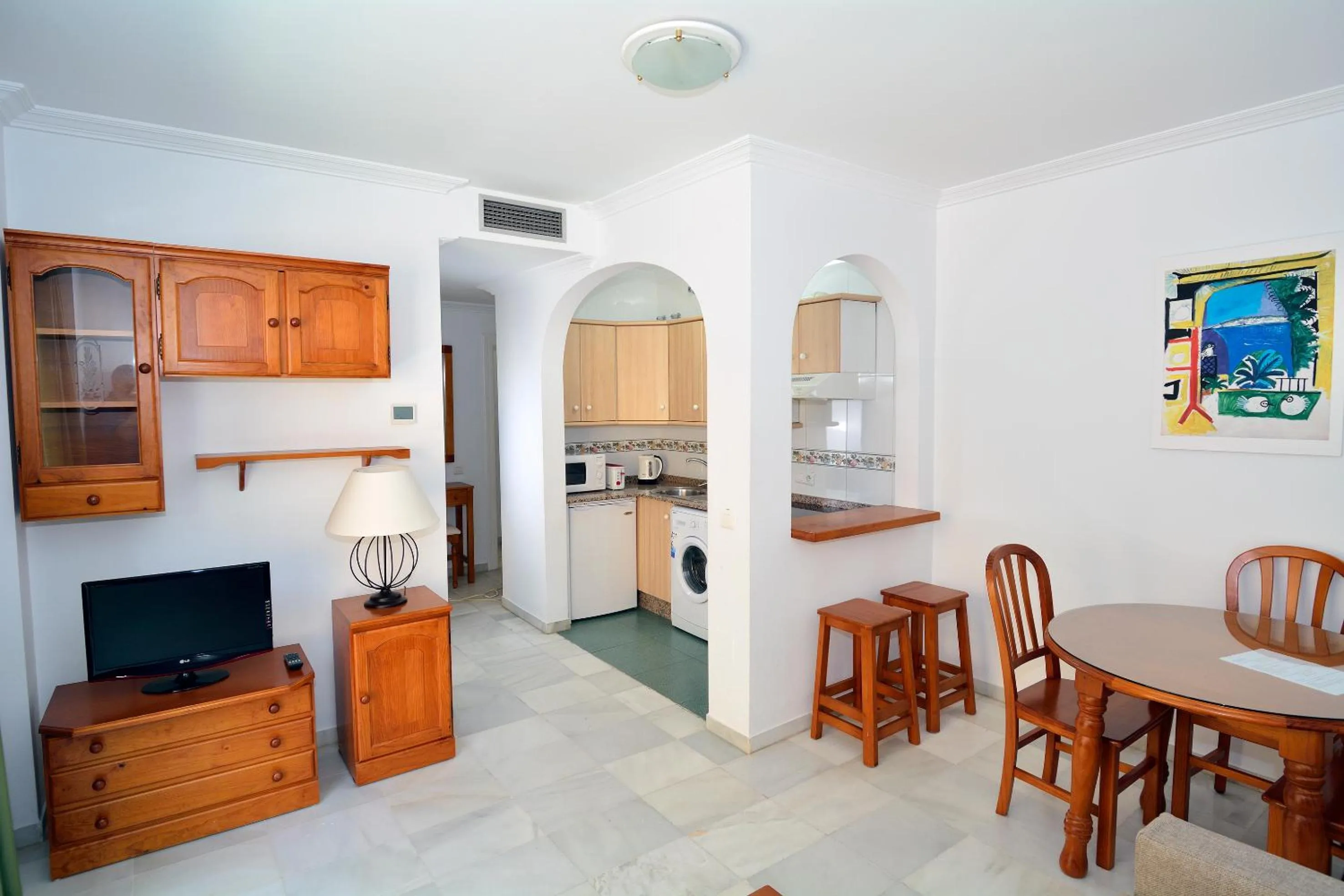 Kitchen or kitchenette in Apartamentos HC Burriana Playa