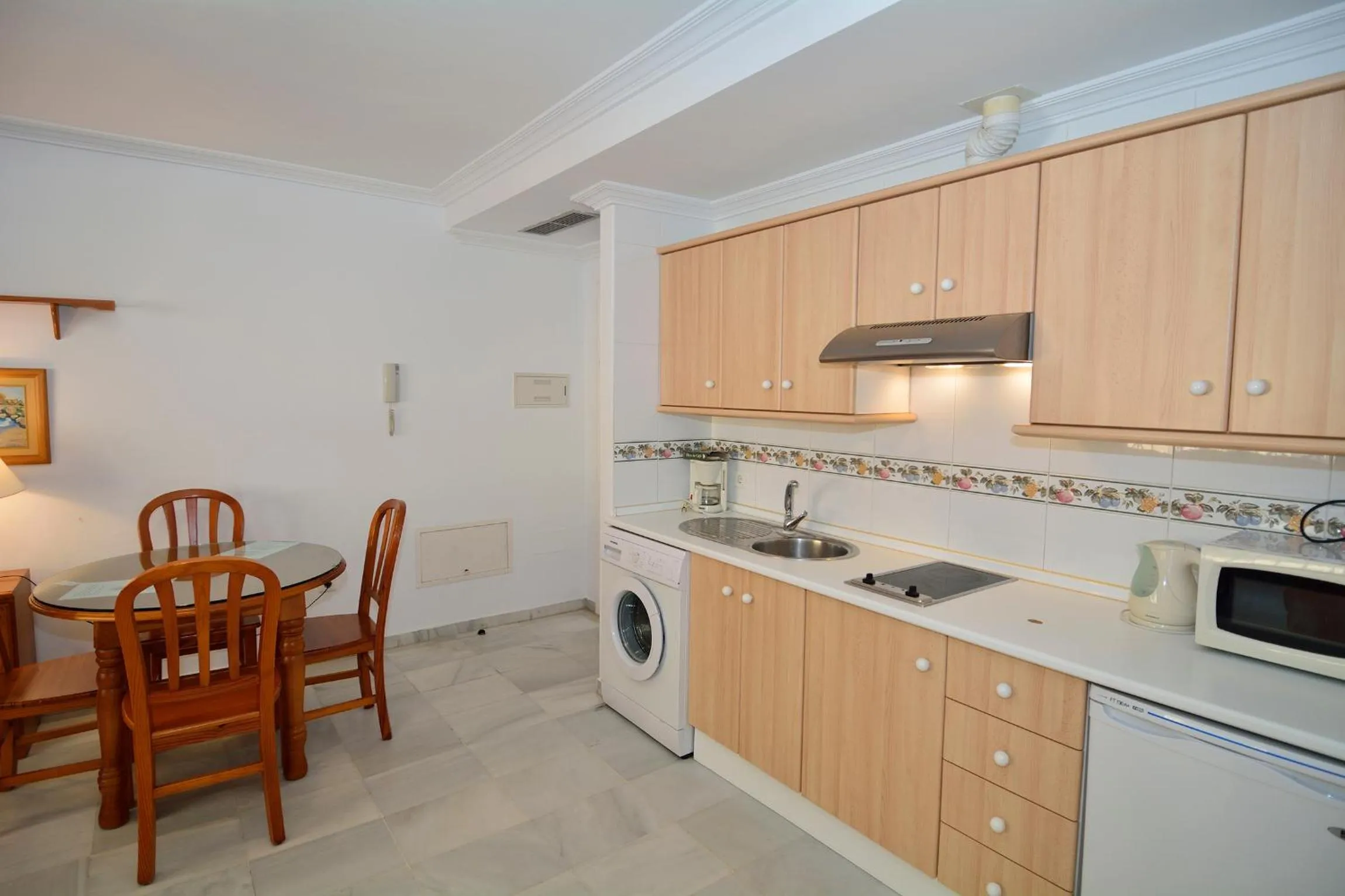 Kitchen or kitchenette in Apartamentos HC Burriana Playa