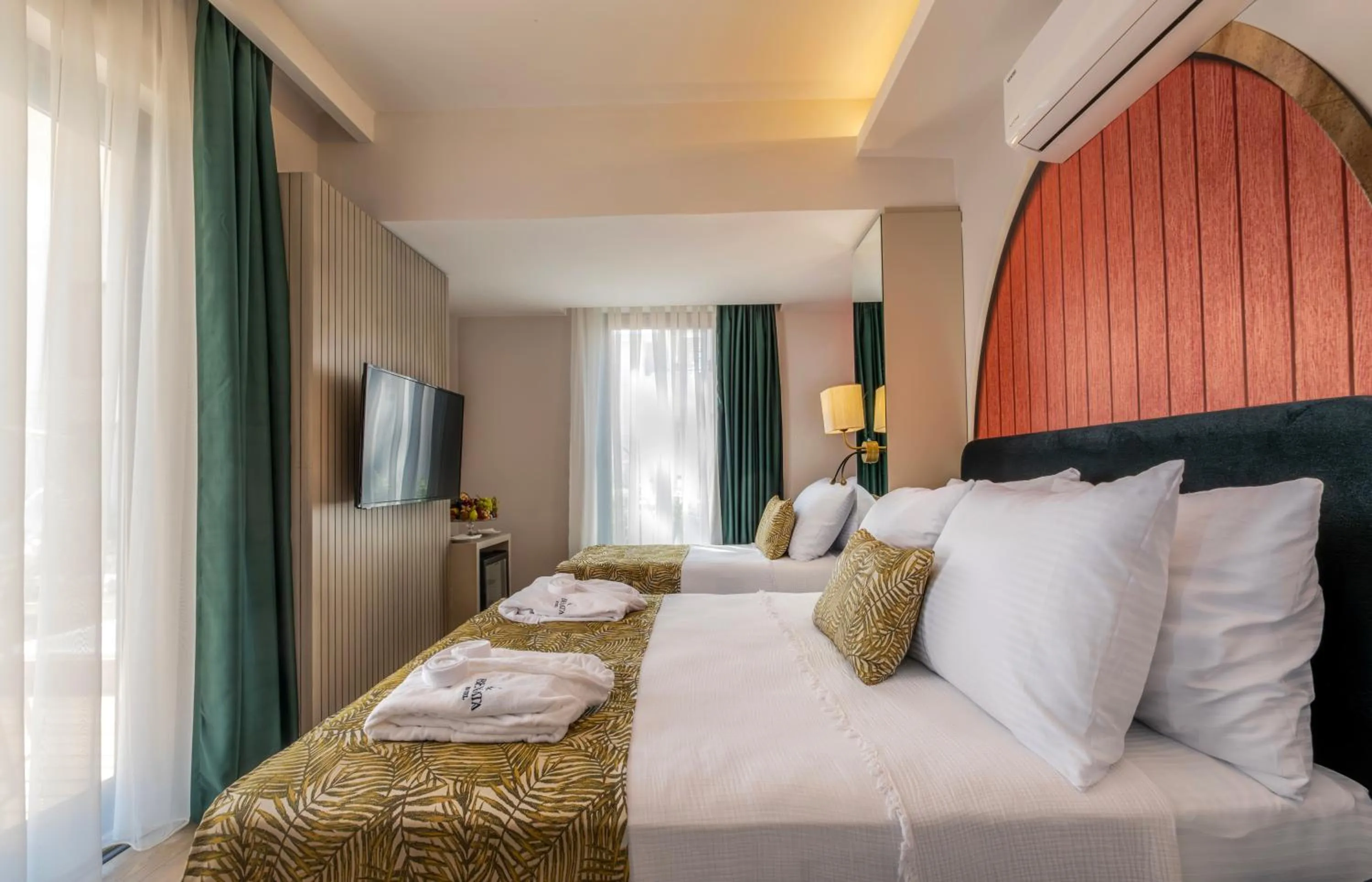 Bed in La Benata Beach Hotel