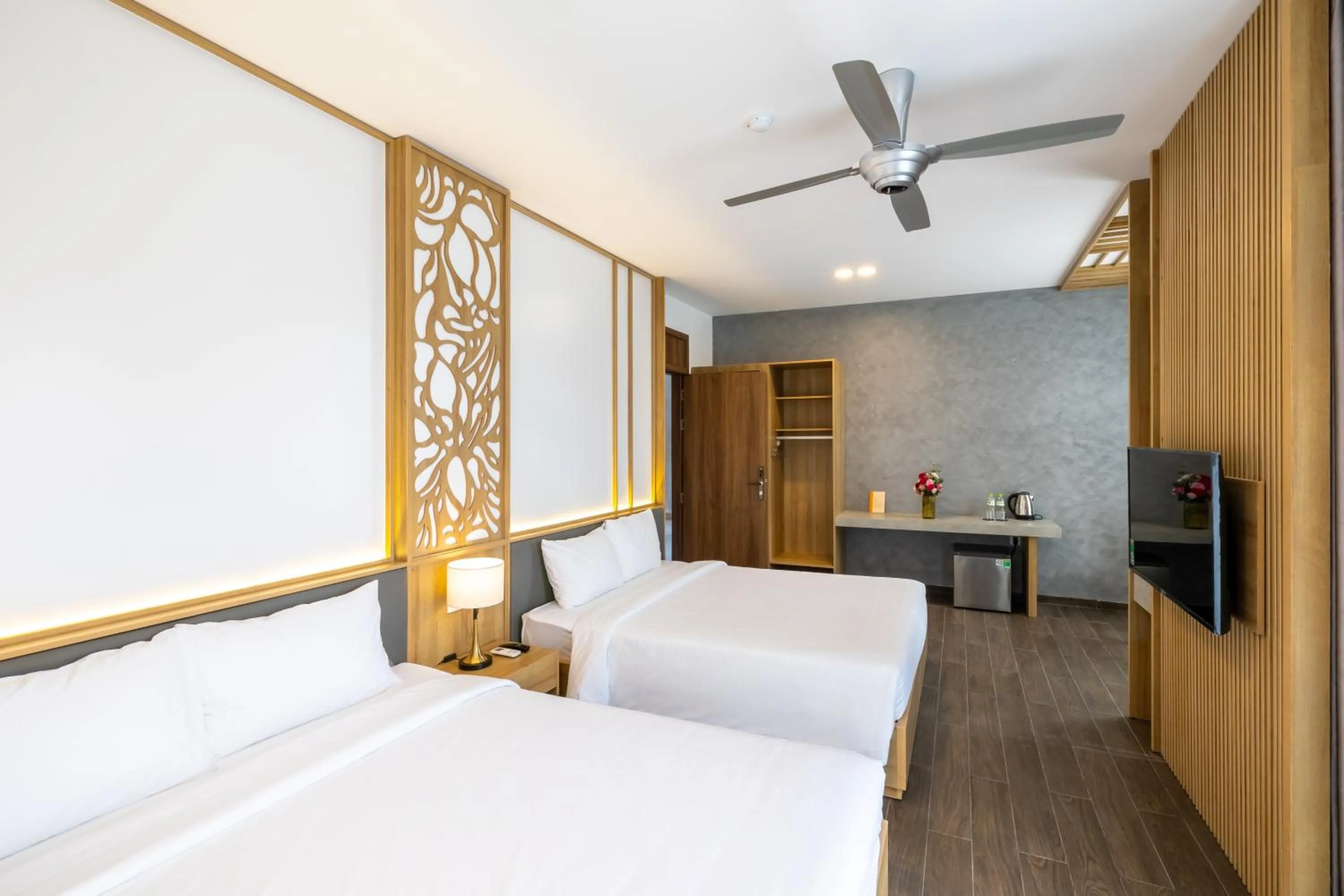 Communal lounge/ TV room, Bed in Moon Sun Boutique Villa Hotel