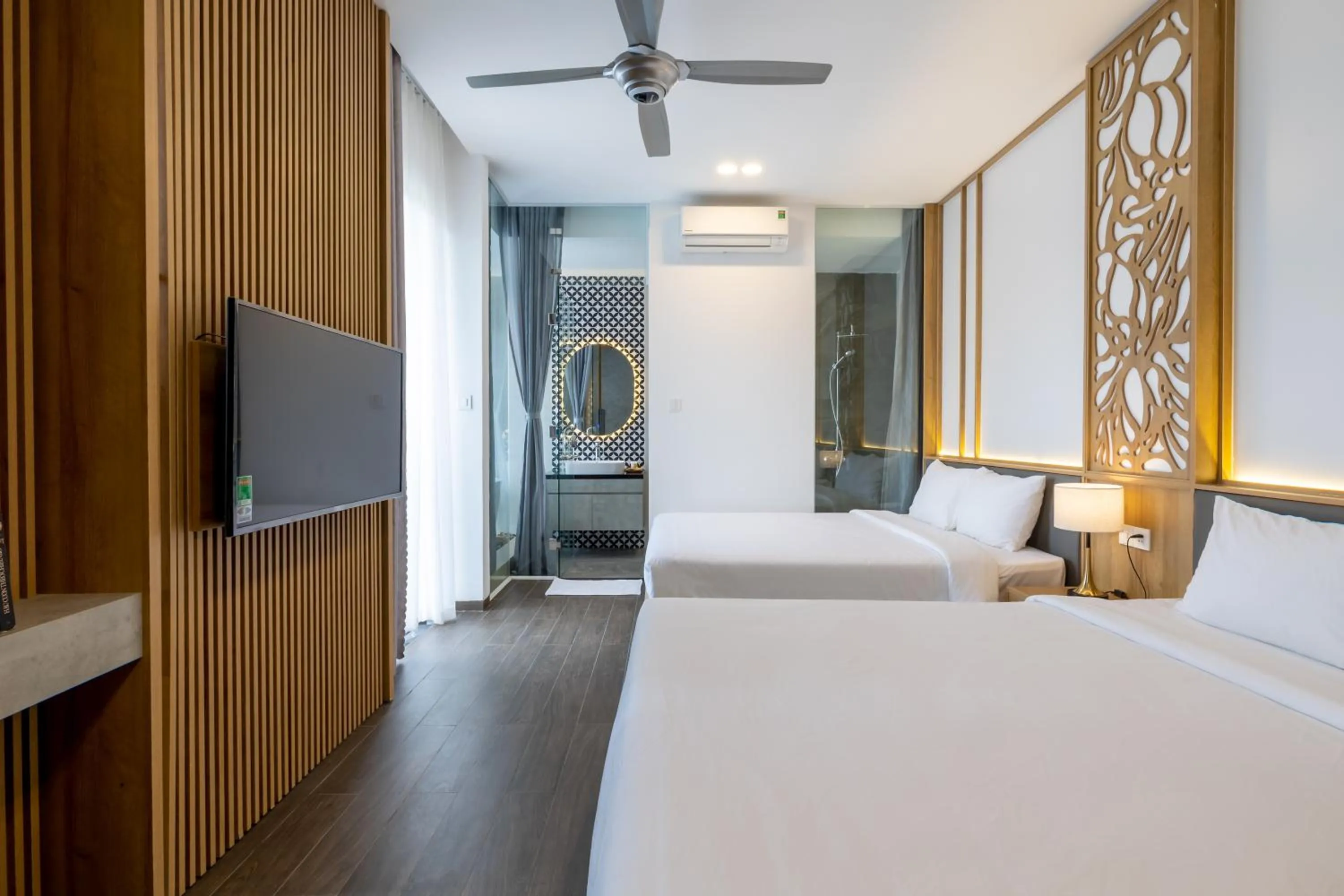 Communal lounge/ TV room, Bed in Moon Sun Boutique Villa Hotel