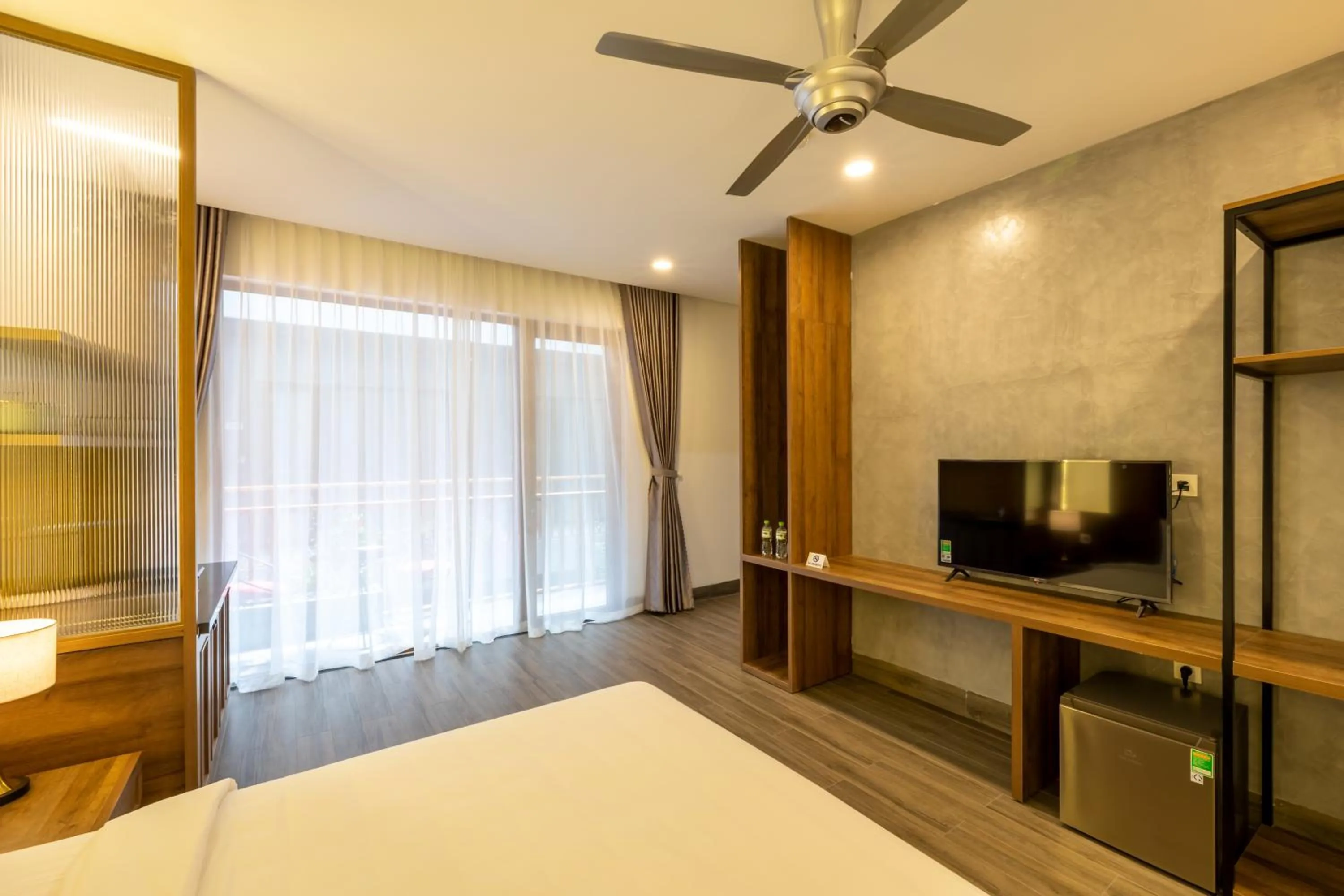 Communal lounge/ TV room, Bed in Moon Sun Boutique Villa Hotel