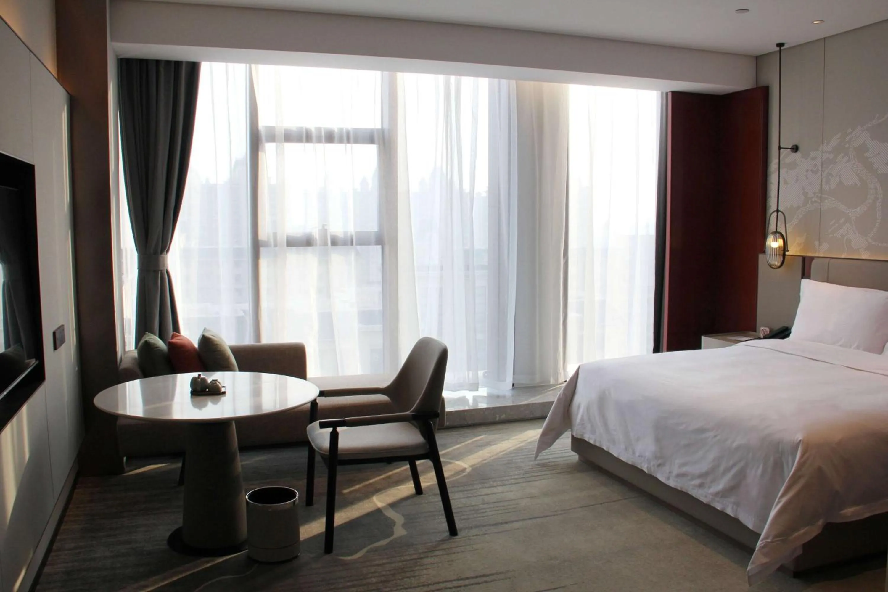 Photo of the whole room, Bed in Ramada By Wyndham Xiangyang Xiangcheng