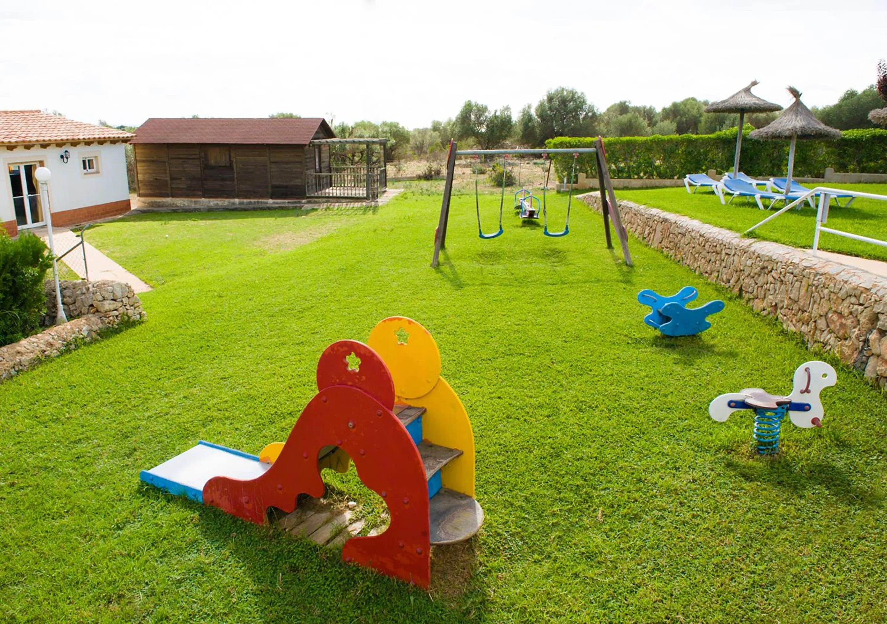 Children play ground in Apartamentos Sol Romántica by DOT Suites
