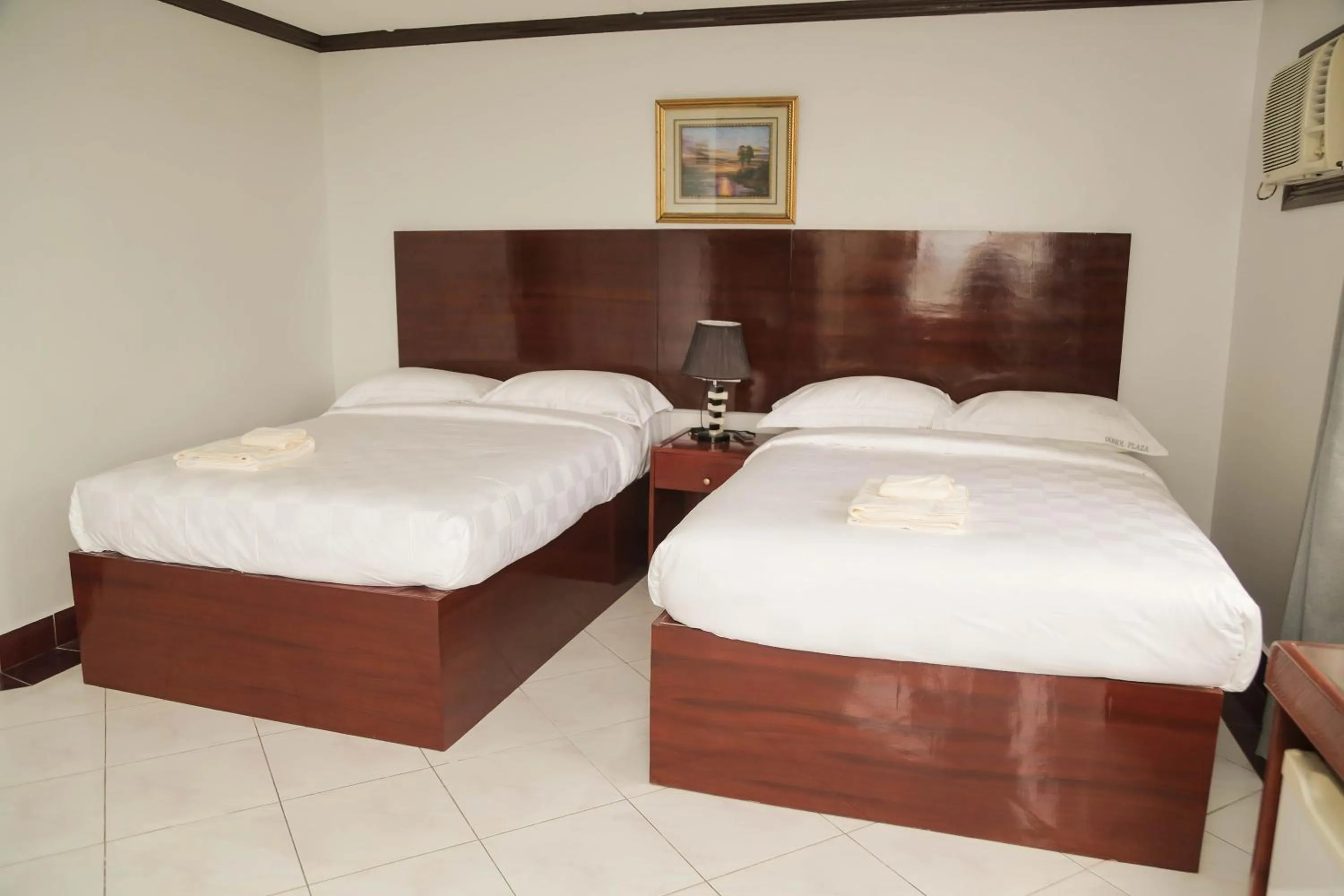 Bed in Bohol Plaza Mountain Resort and Restaurant