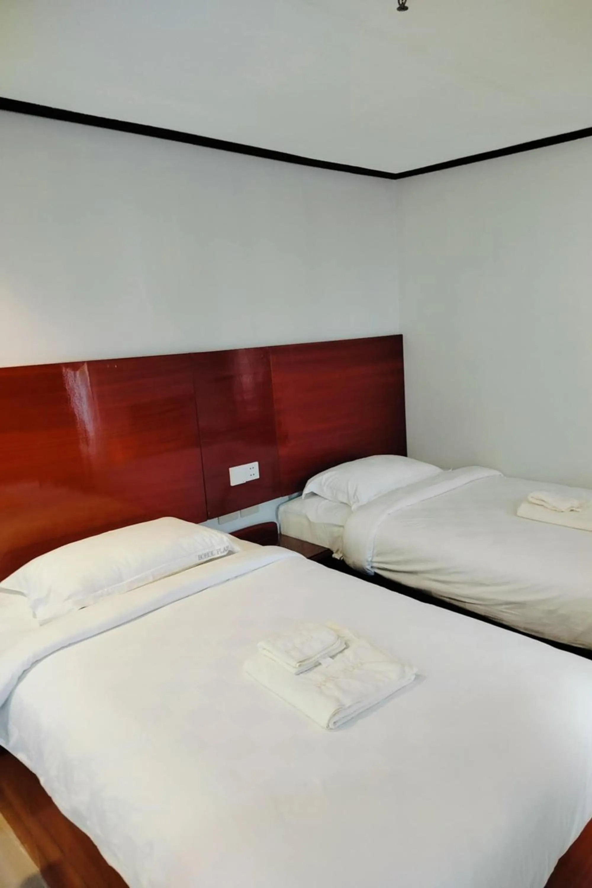 Bed in Bohol Plaza Mountain Resort and Restaurant