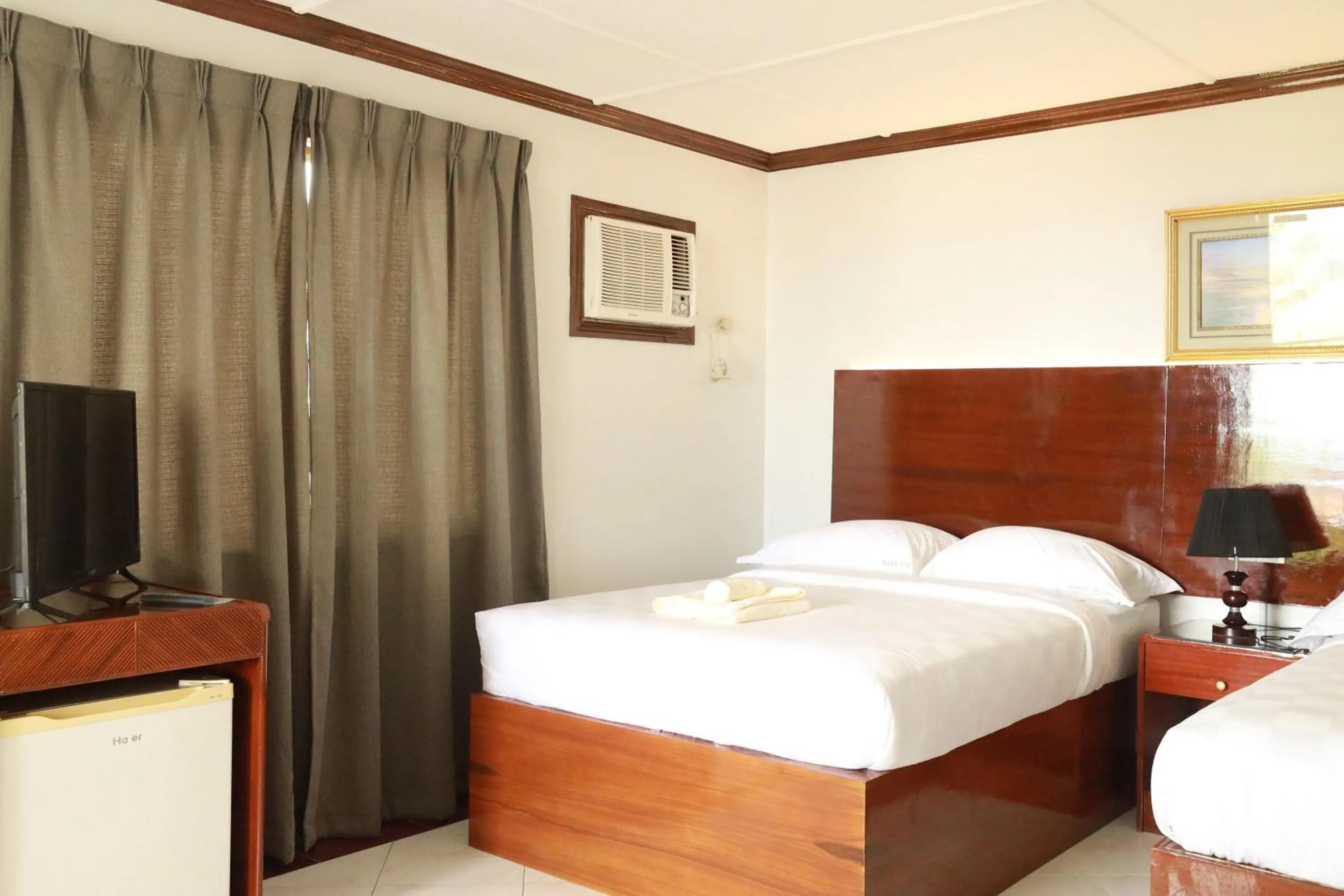 Bed in Bohol Plaza Mountain Resort and Restaurant