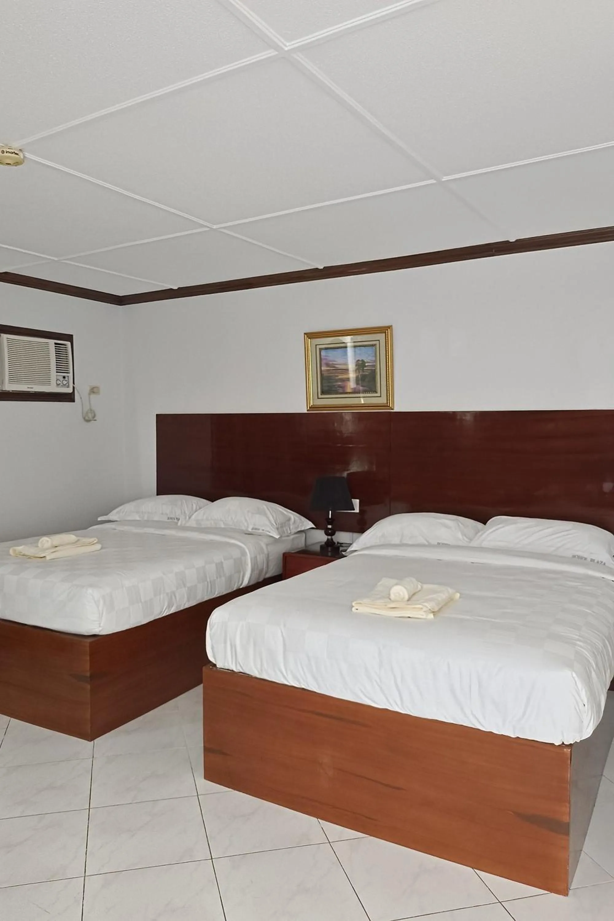 Bed in Bohol Plaza Mountain Resort and Restaurant