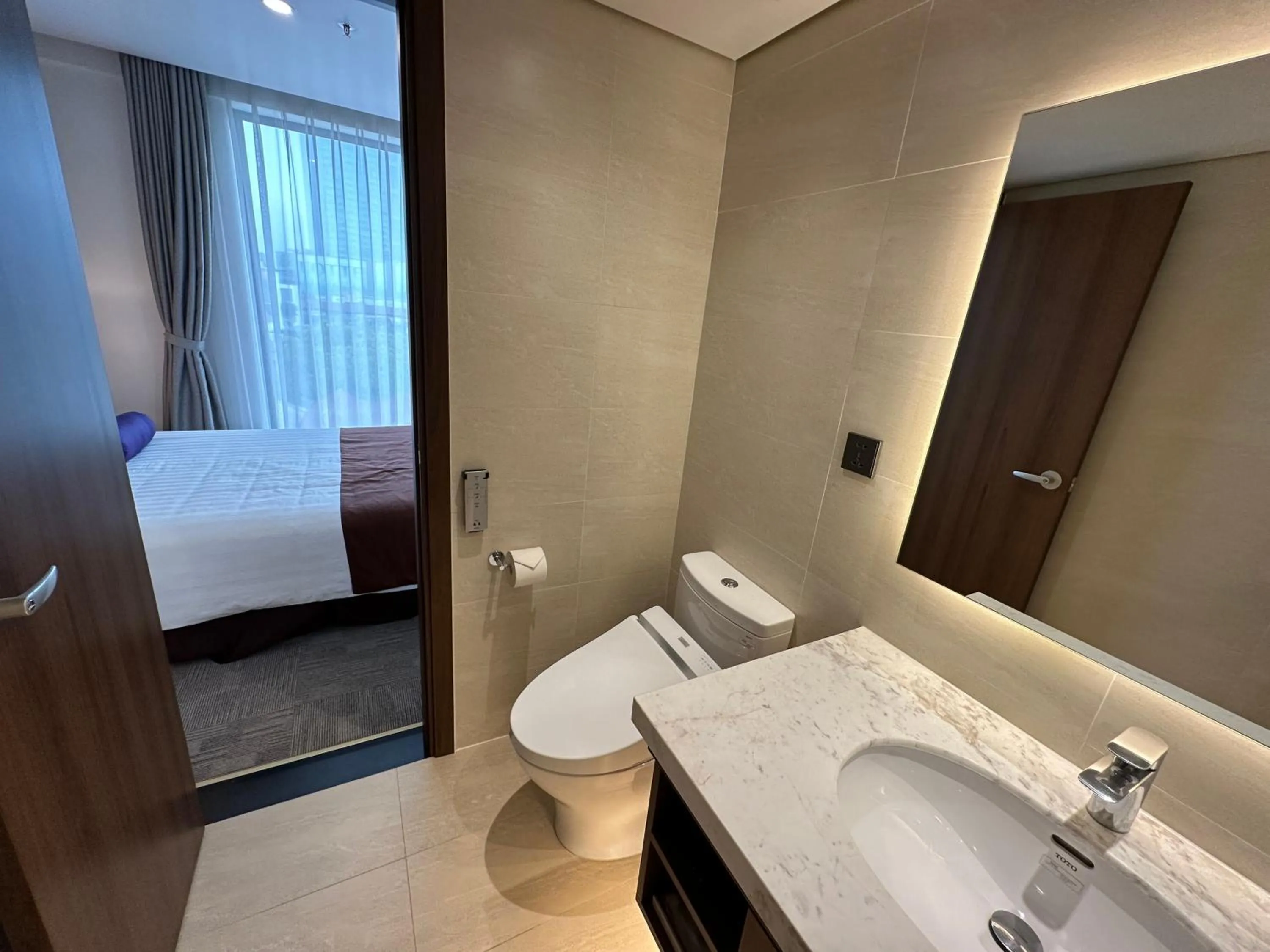 Toilet, Bed in Hotel Yah Hanoi & Spa