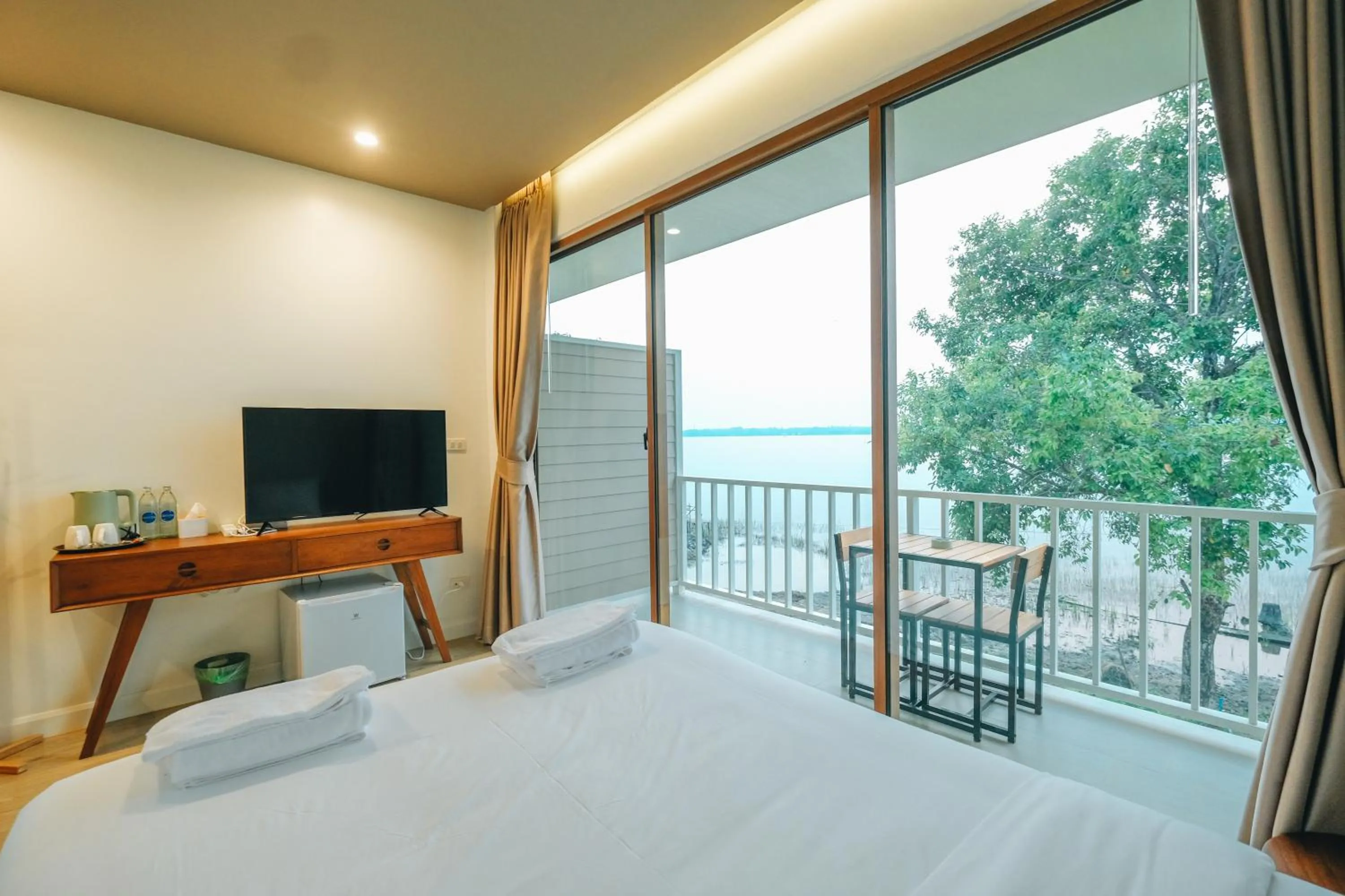 Bed in LAKE HOUSE Naka Cave