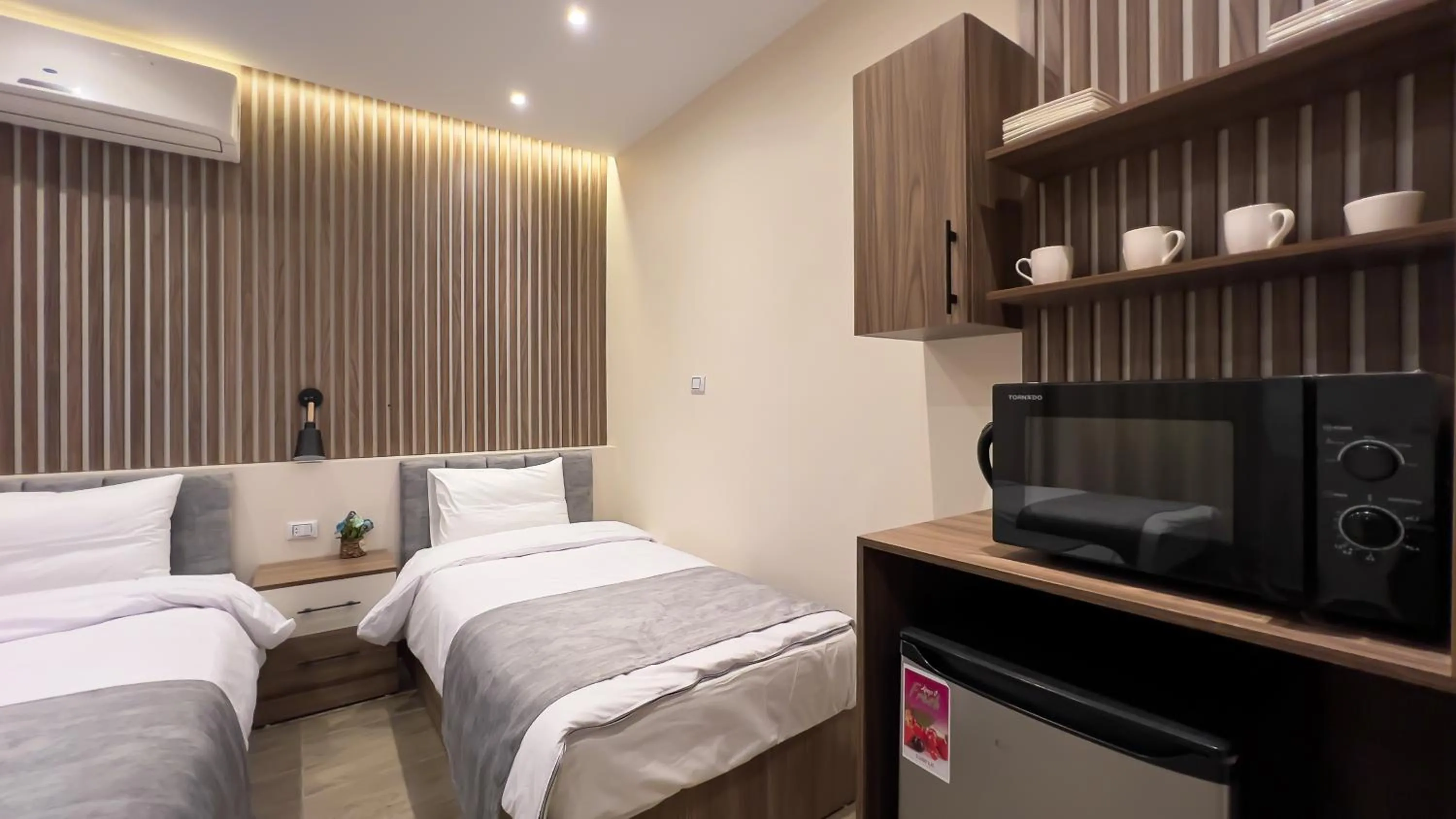 Kitchen or kitchenette, Bed in STEPS IN Pyramids View