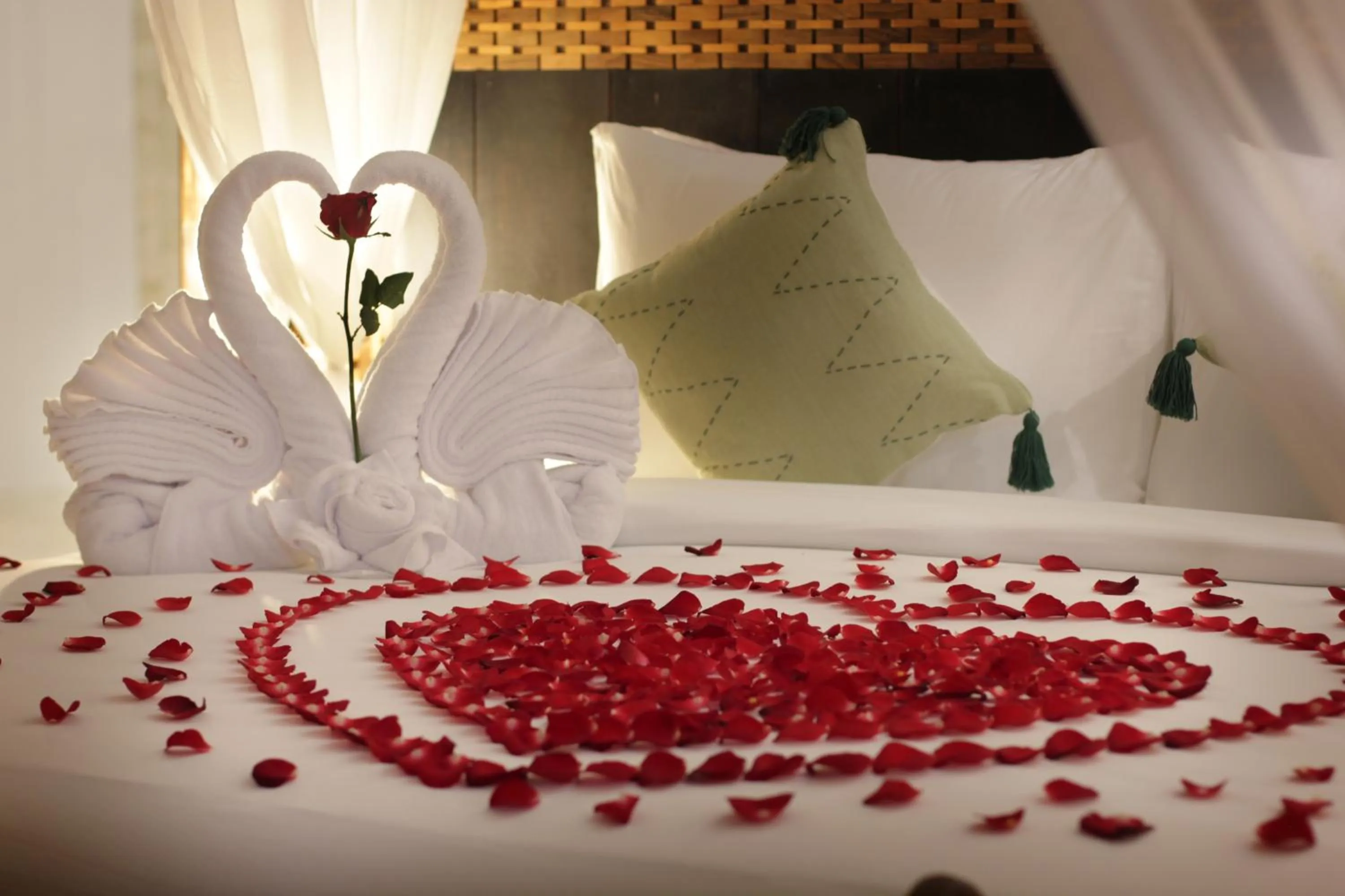 Bed in The Tirta Sari Villas