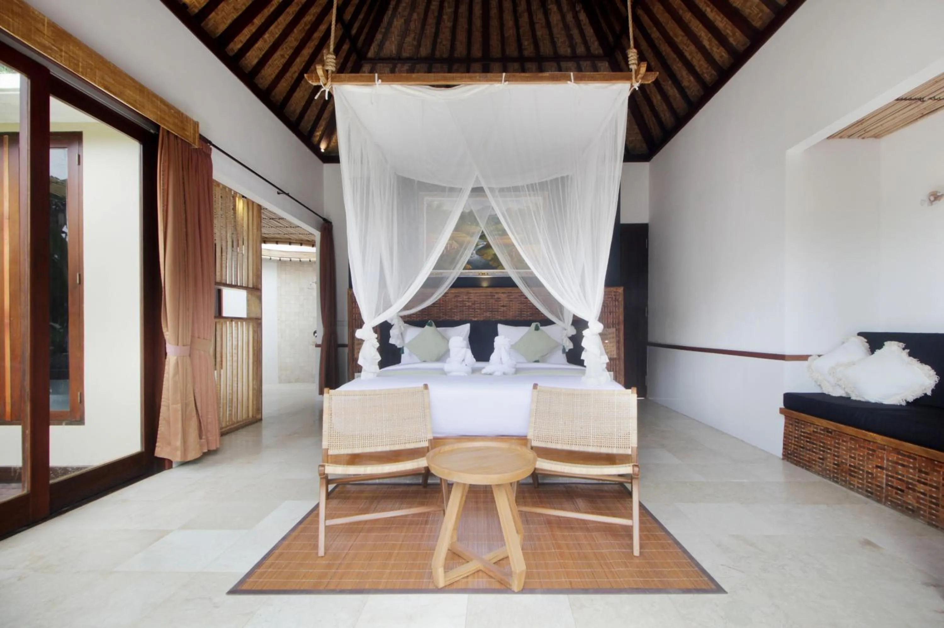 Photo of the whole room, Bed in The Tirta Sari Villas
