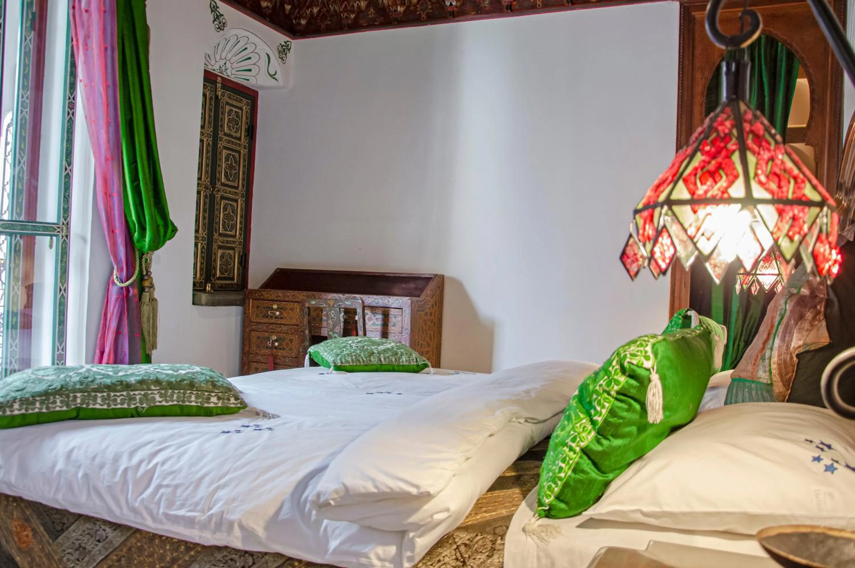 Bed in Riad Esmeralda