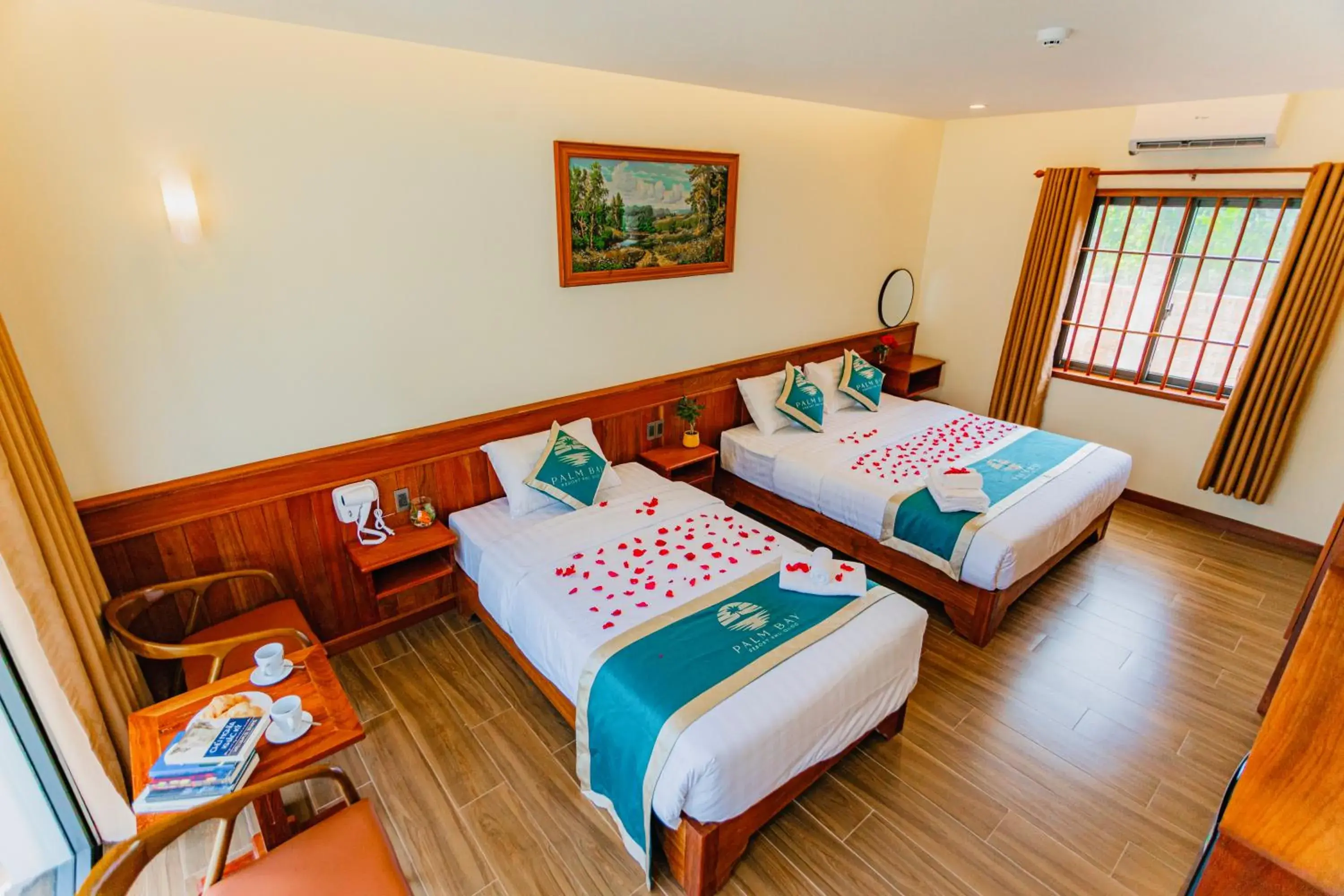 Deluxe Triple Room in Palm Bay Resort Phu Quoc Deluxe Triple Room in Palm Bay Resort Phu Quoc
