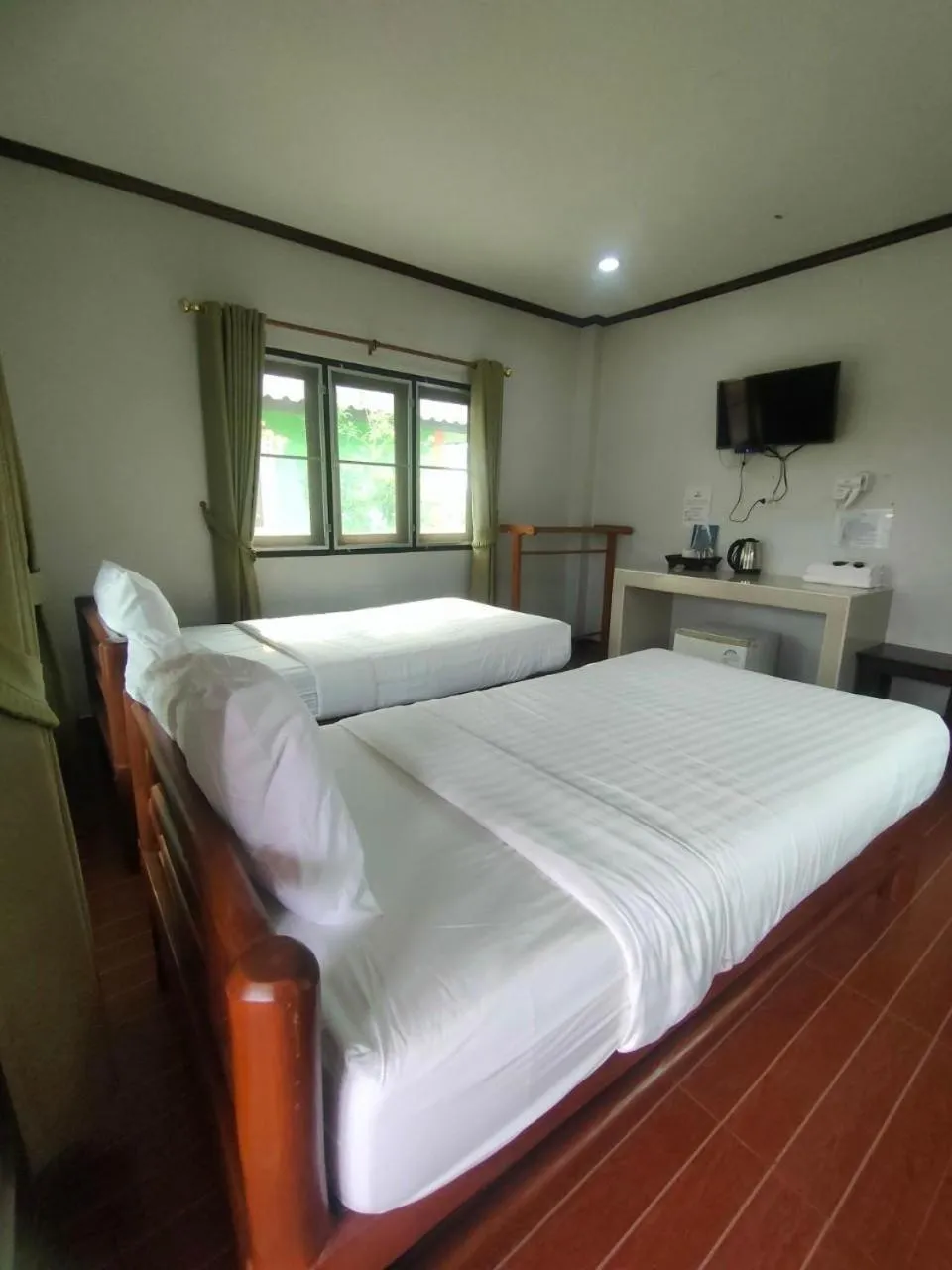 Bed in Chatchawan Resort