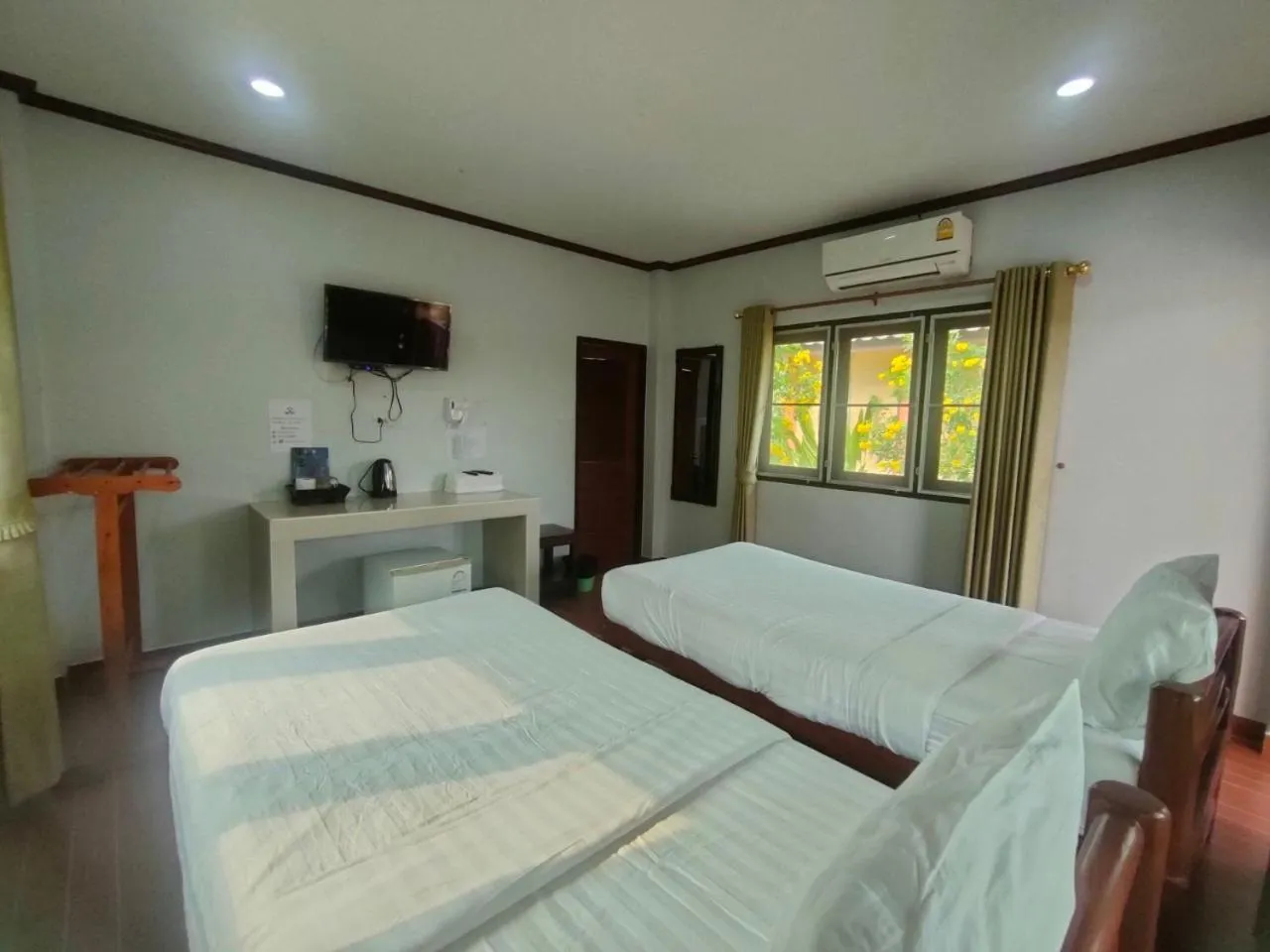 Bed in Chatchawan Resort
