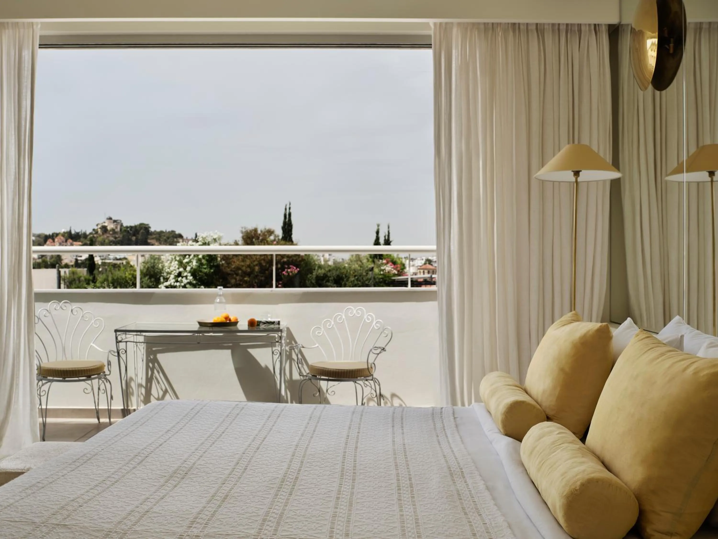 Bed in Apollo Palm Hotel