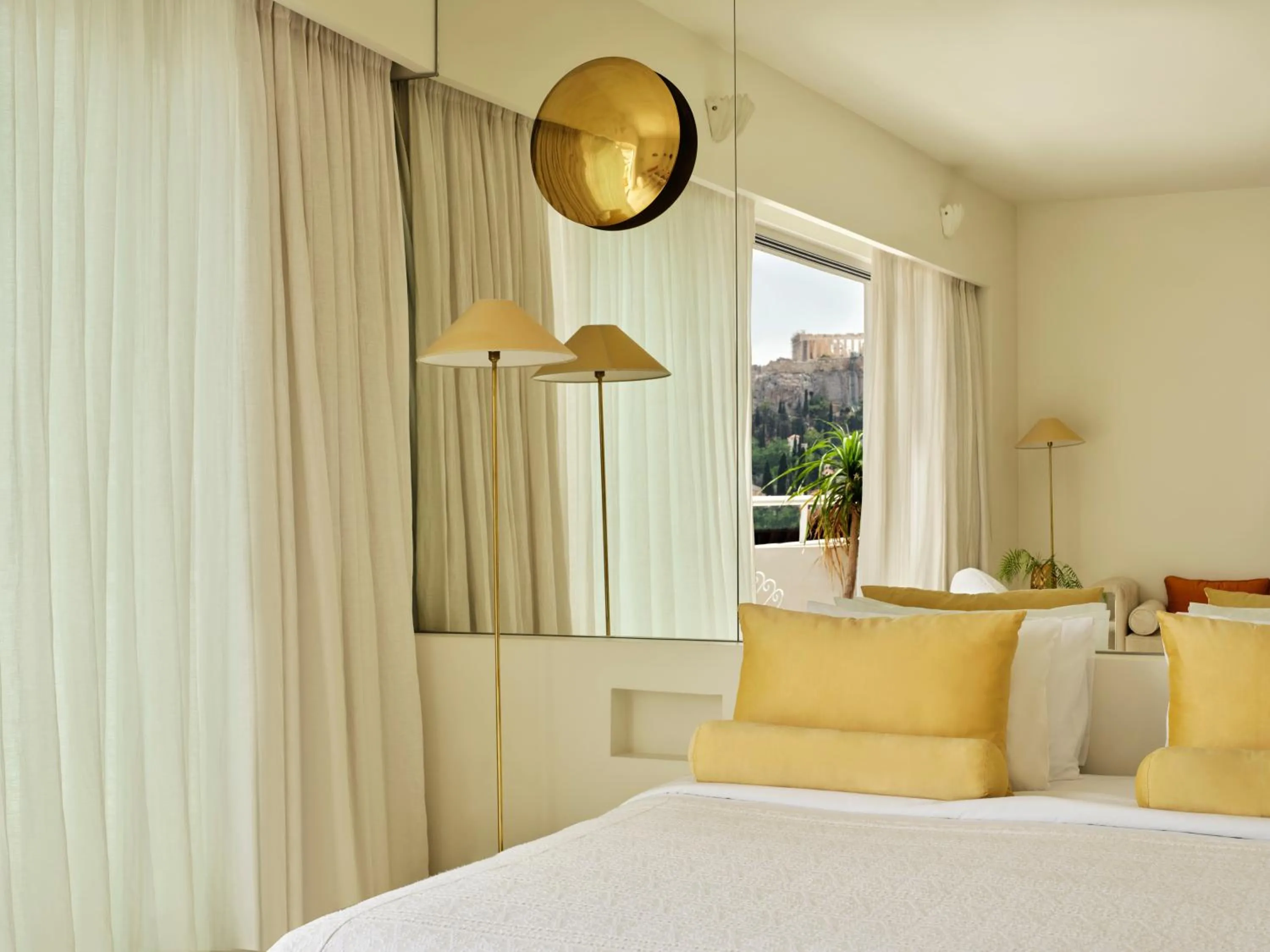 Bed in Apollo Palm Hotel