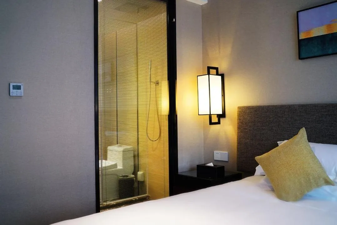 Bed in SSAW Boutique Hotel Shanghai Huangpu River
