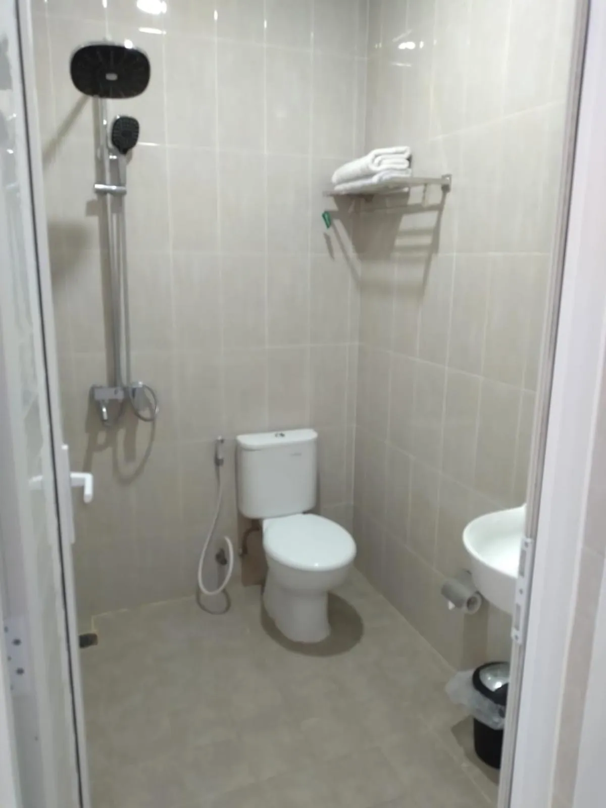 Bathroom in PURNAMA BALIGE HOTEL