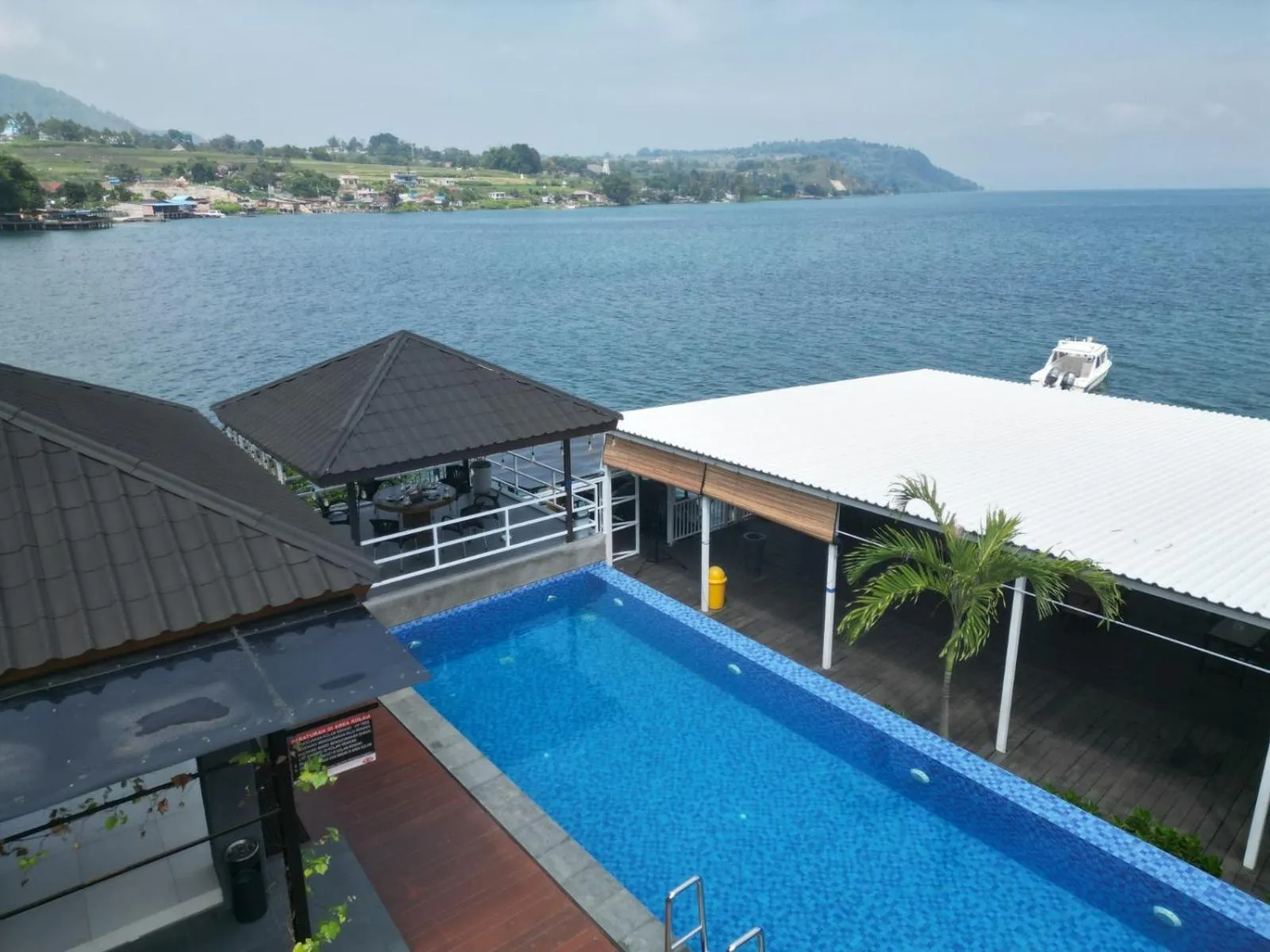 Swimming pool in PURNAMA BALIGE HOTEL