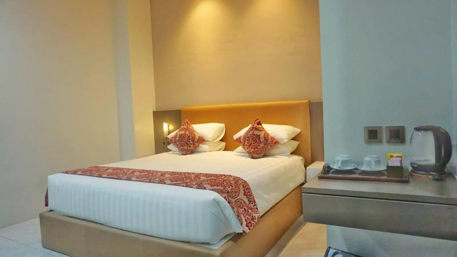 Bed in PURNAMA BALIGE HOTEL